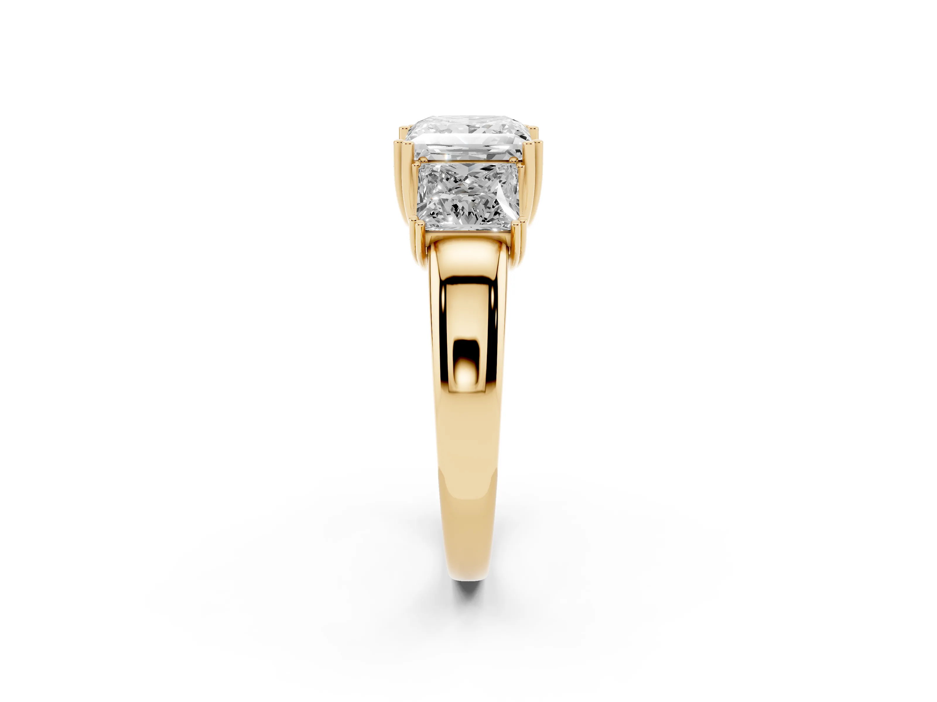 Princess Cut Diamond Three-Stone Ring Set in Yellow gold with Polished Channel-Set Band