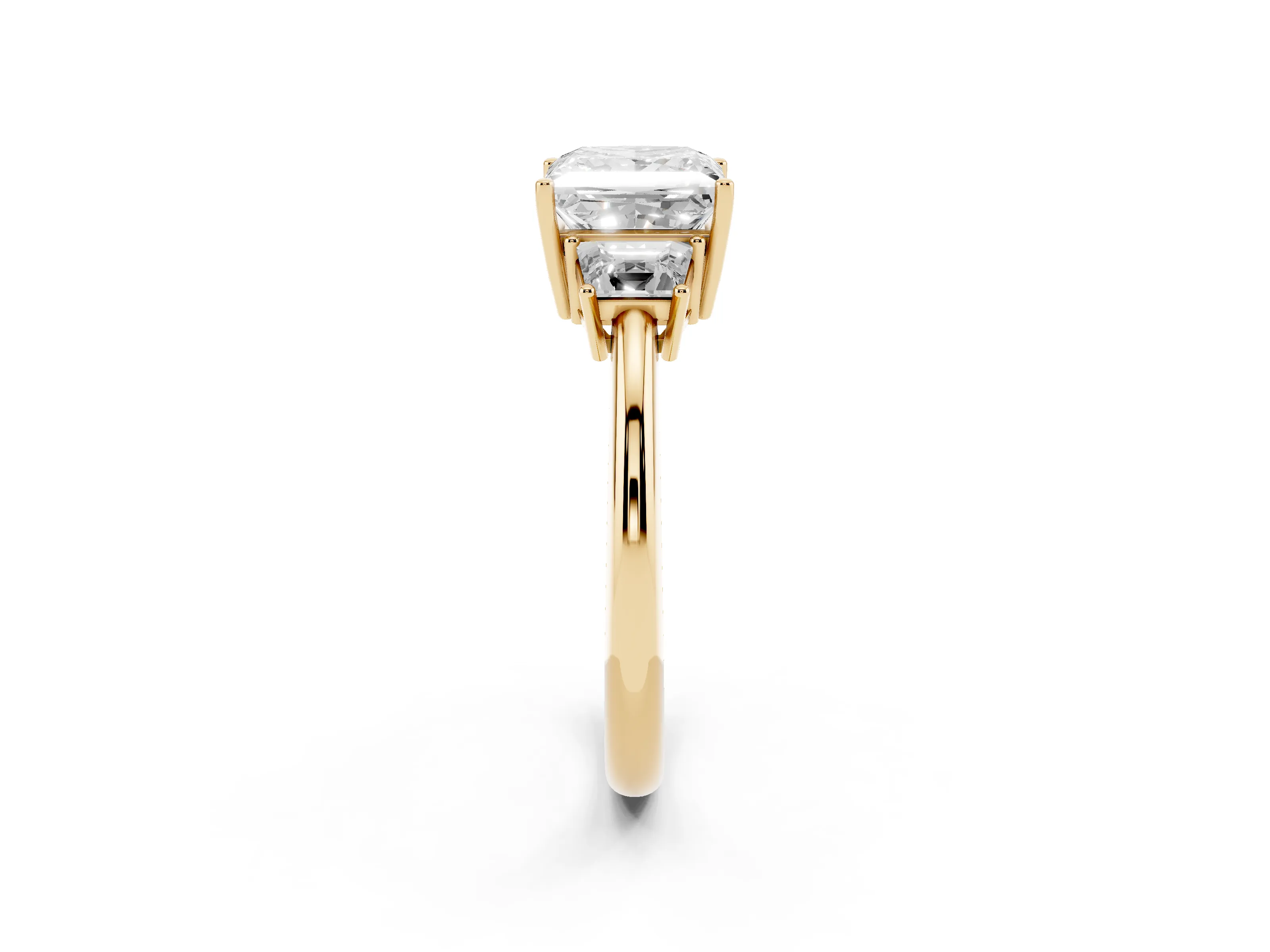 Princess Cut Diamond Three-Stone Ring Set in Yellow gold with Trapezoid Side Stones and Prong Setting