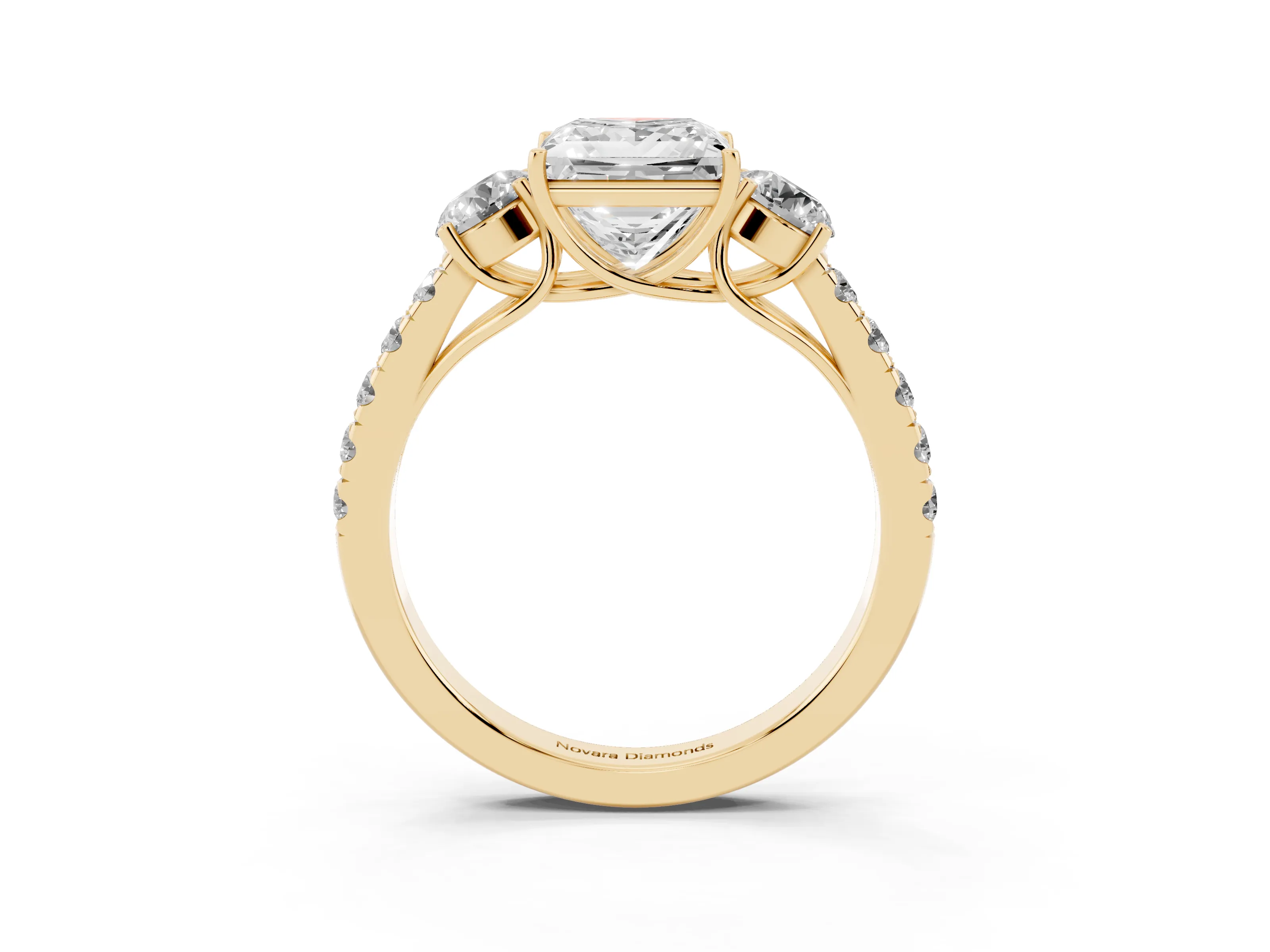Princess Cut Diamond Three-Stone Ring Set in Yellow gold with Round Side Stones and Delicate Pavé Band