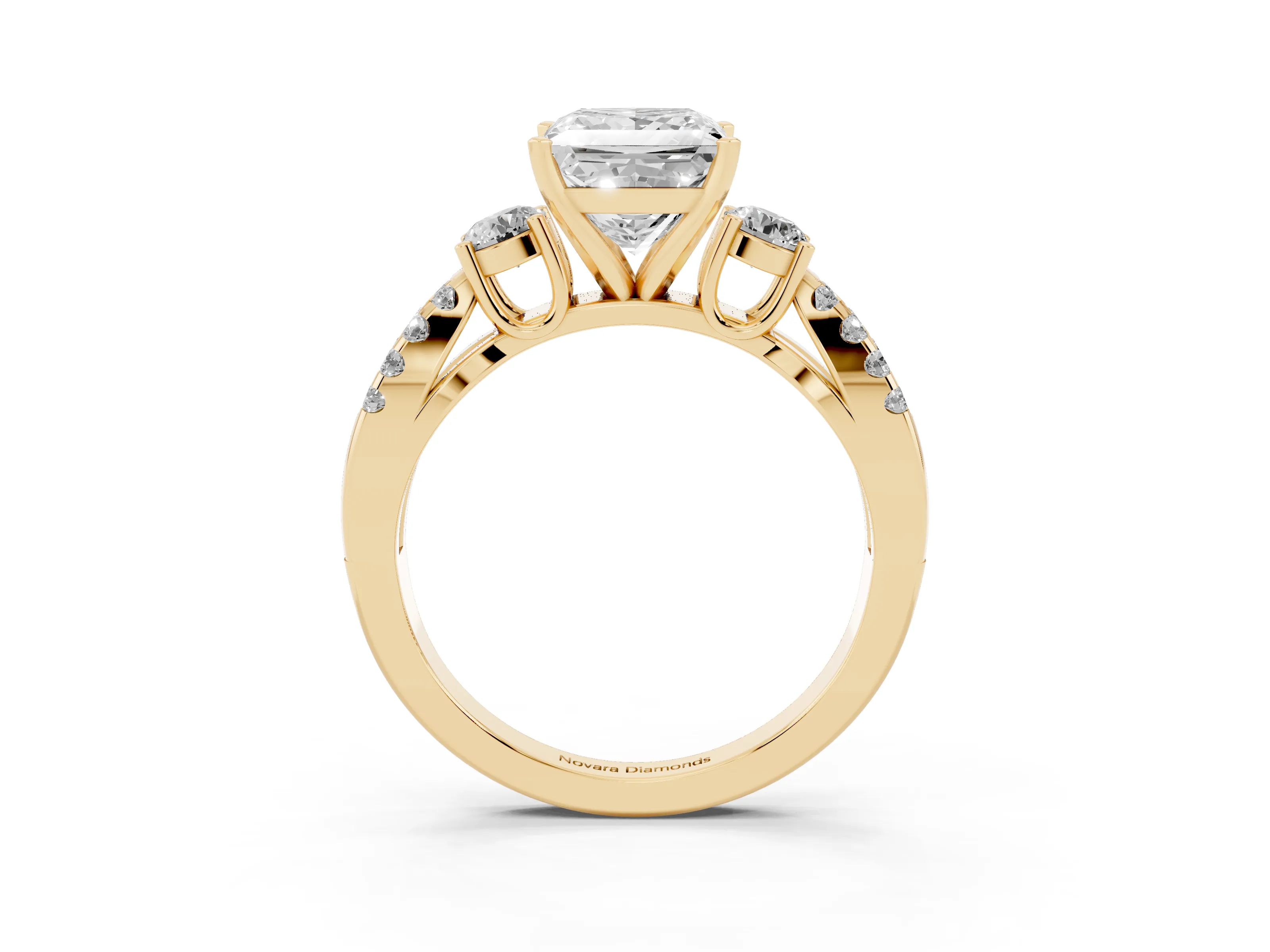 Princess Cut Diamond Three-Stone Ring Set in Yellow gold with Pavé Split Shank and Prong Setting