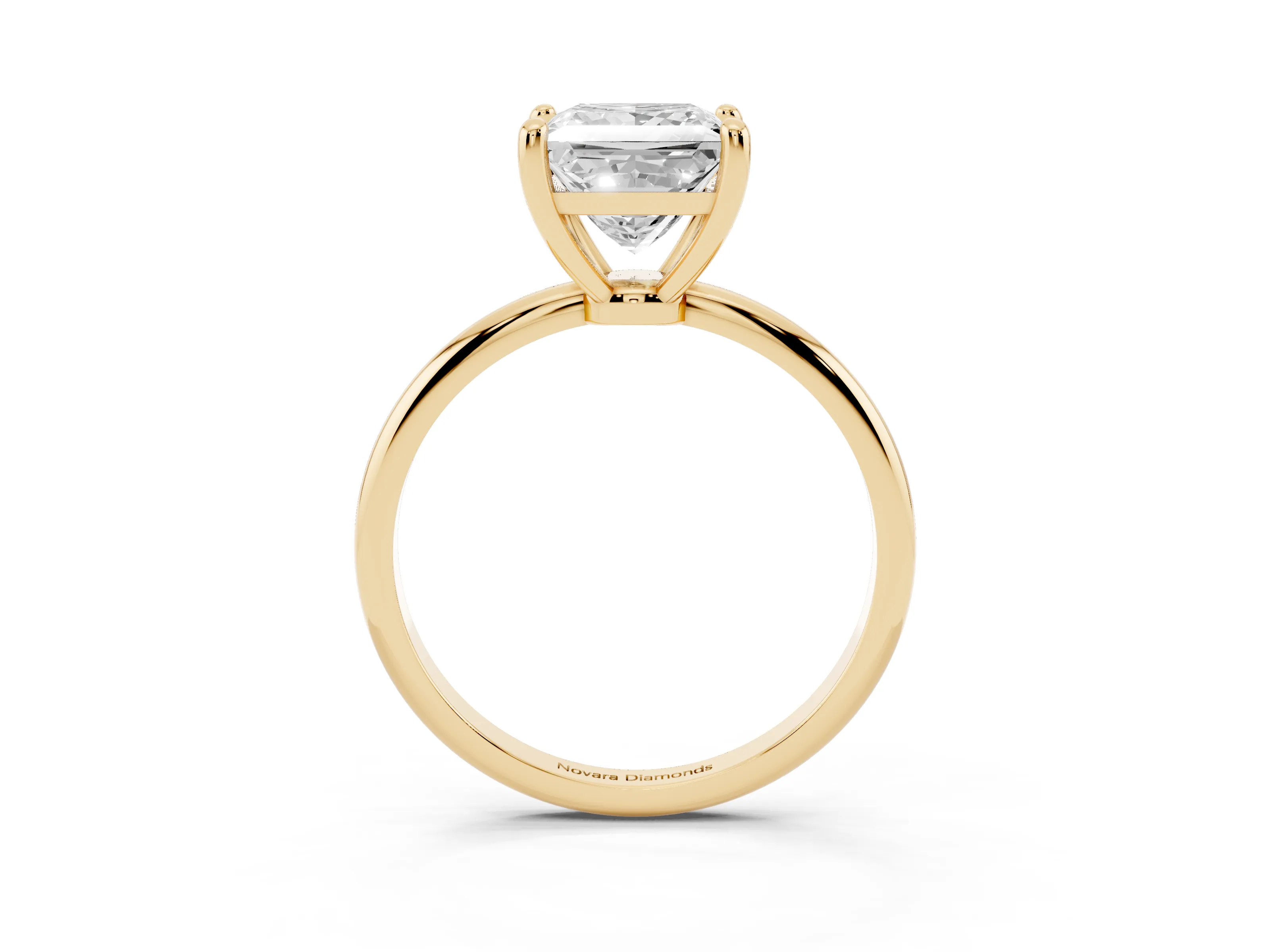 Princess Cut Diamond Solitaire Ring Set in Yellow gold with Secure Prong Setting on a Classic Band