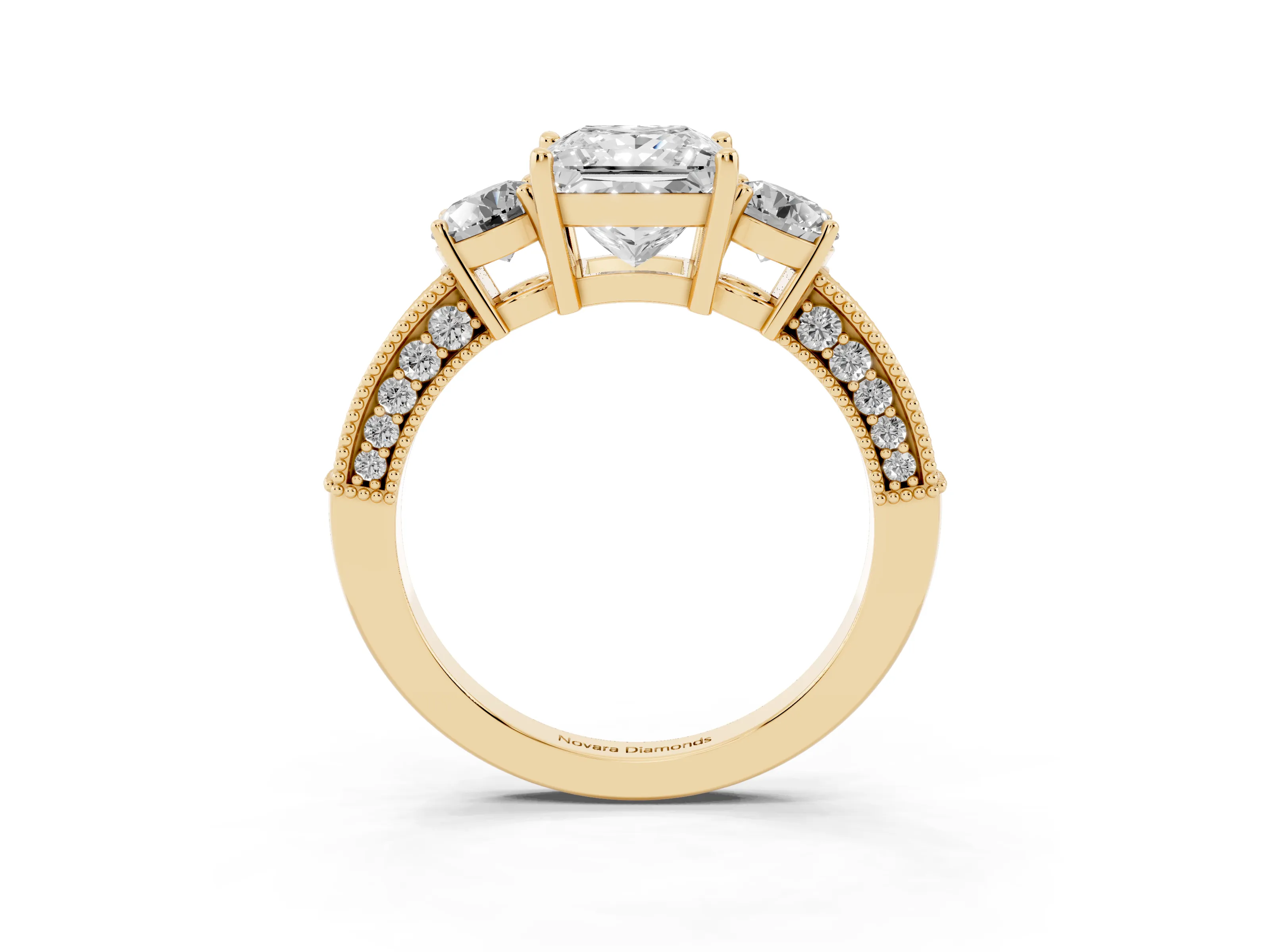 Princess Cut Diamond Three-Stone Ring Set in Yellow gold with Round Side Stones and Pavé Band