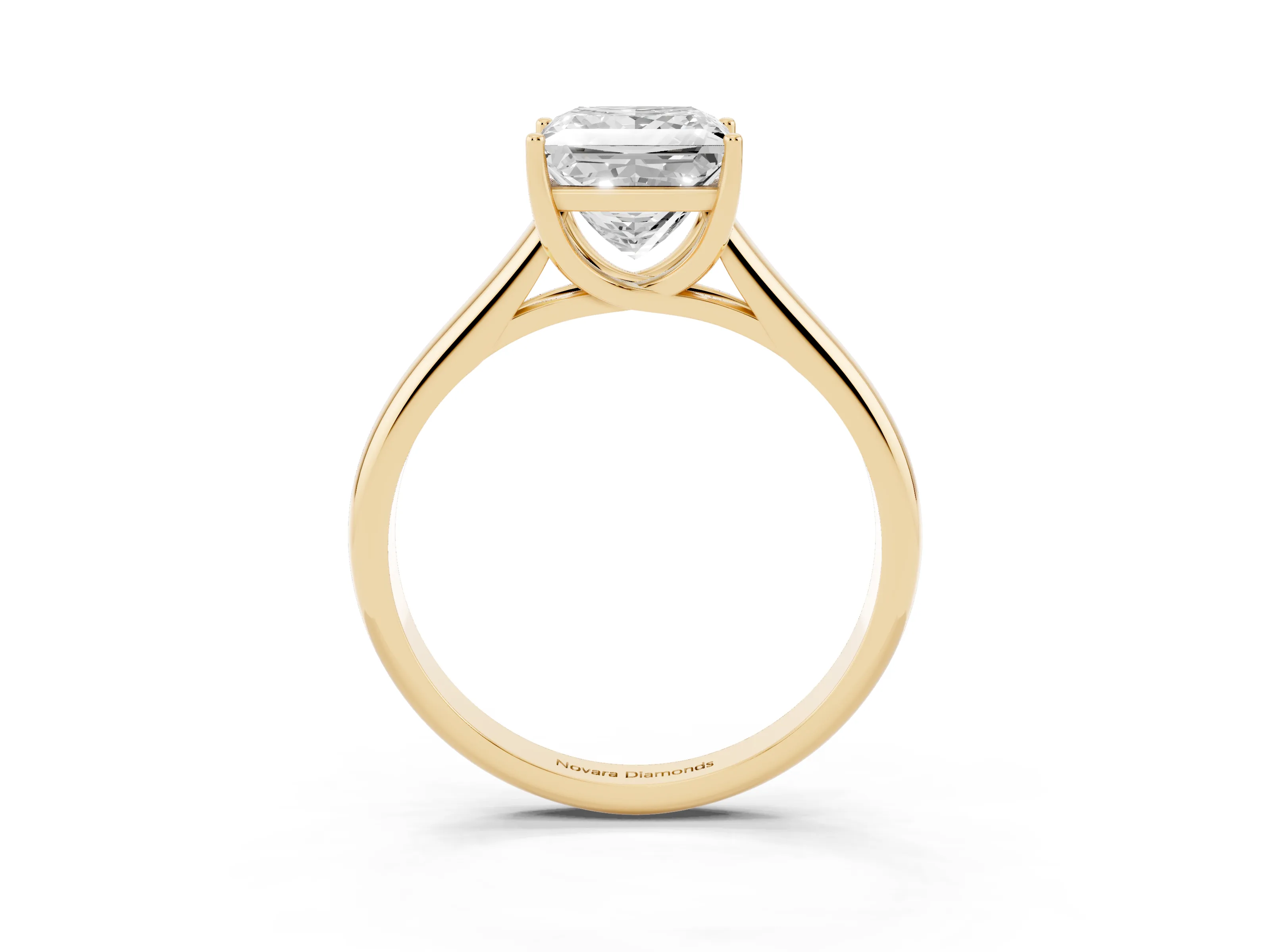 Princess Cut Diamond Solitaire Engagement Ring Set in Yellow gold with Subtly Tapered Band and Prong Setting