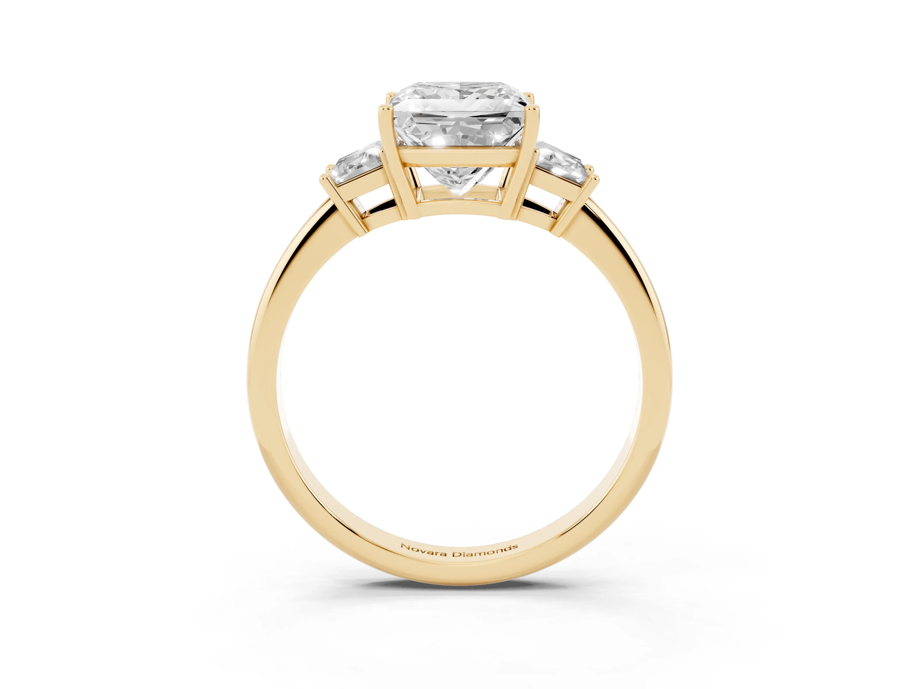 Princess Cut Diamond Three-Stone Ring Set in Yellow gold with Trapezoid Side Stones and Prong Setting