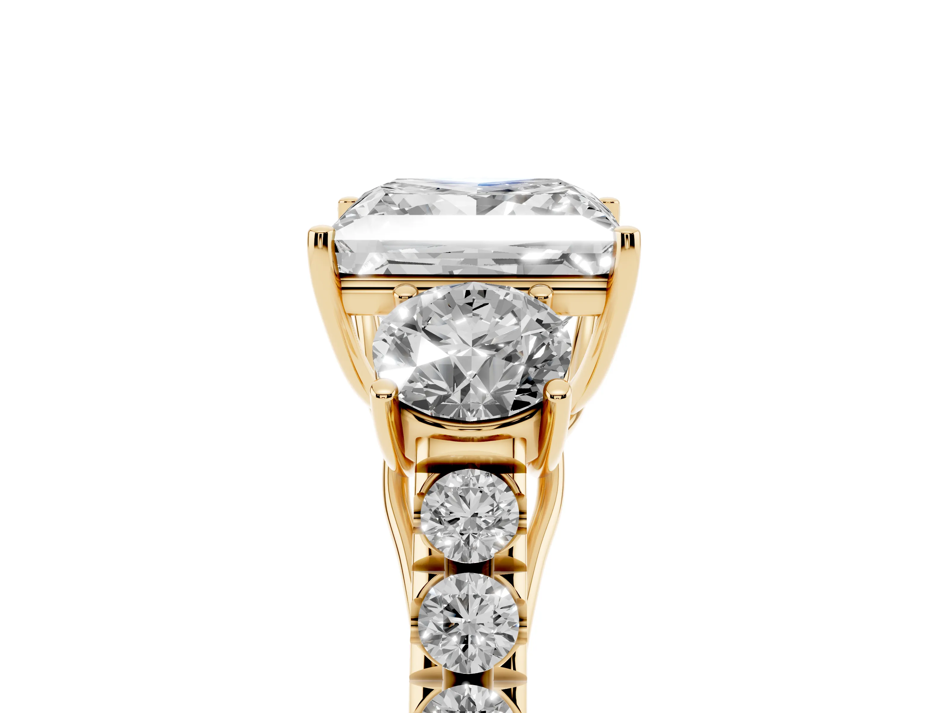 Princess Cut Diamond Three-Stone Ring Set in Yellow gold with Round Side Stones and Delicate Pavé Band