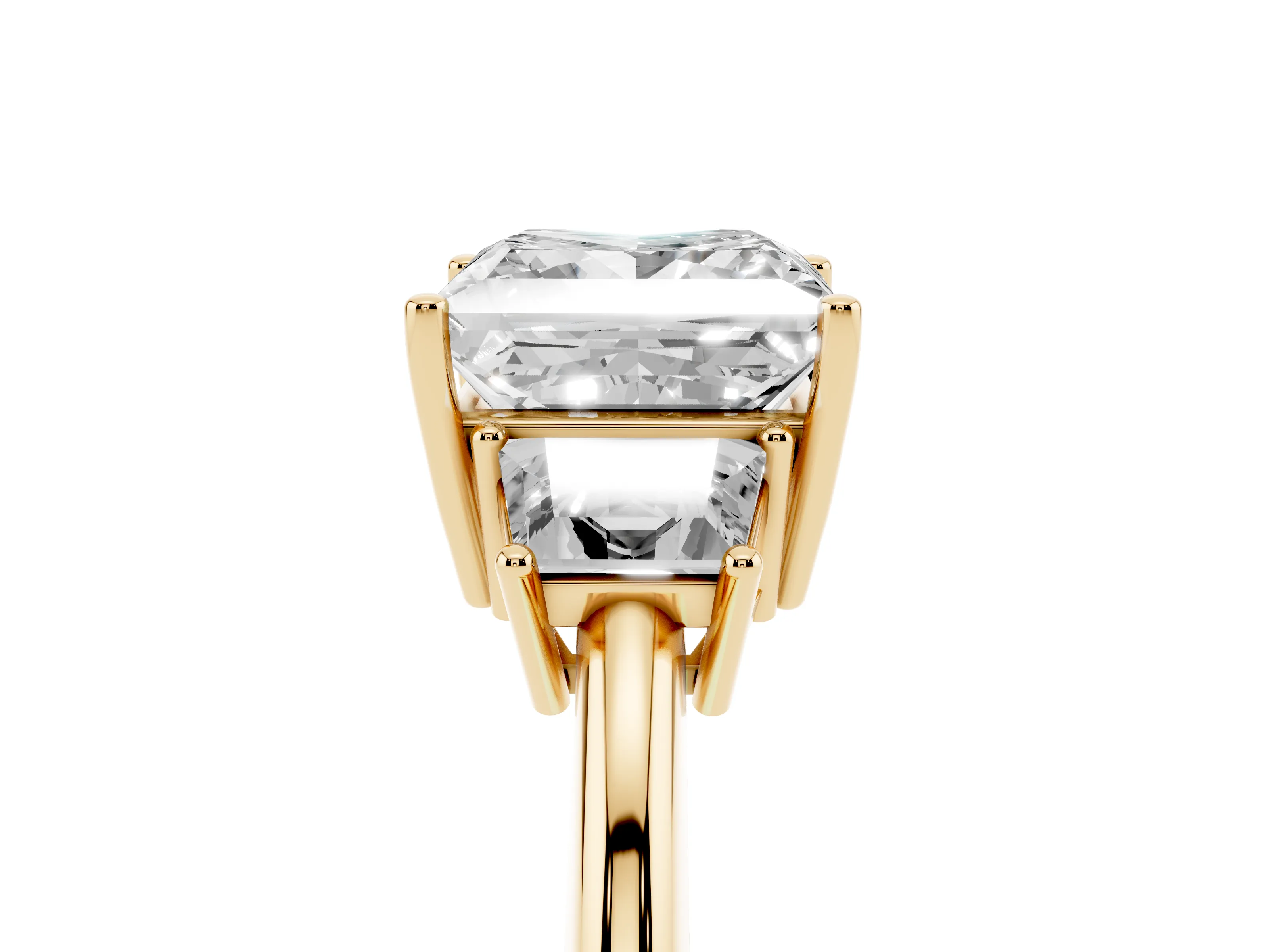 Princess Cut Diamond Three-Stone Ring Set in Yellow gold with Trapezoid Side Stones and Prong Setting