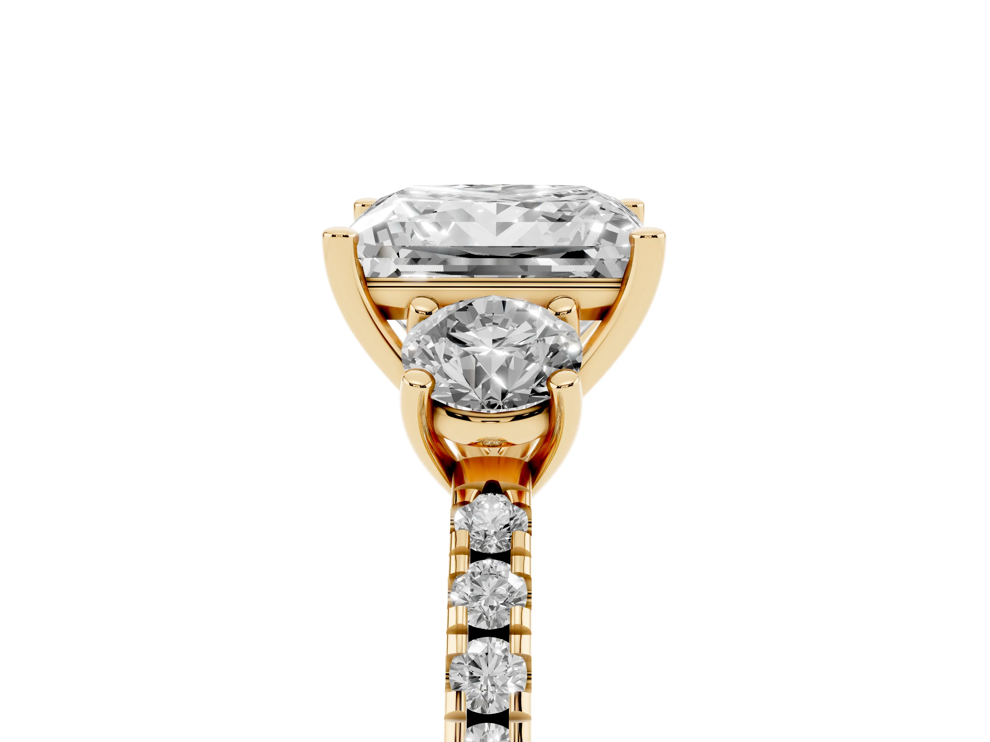 Princess Cut Diamond Three-Stone Ring Set in Yellow gold with Pavé Band and Graduated Sides
