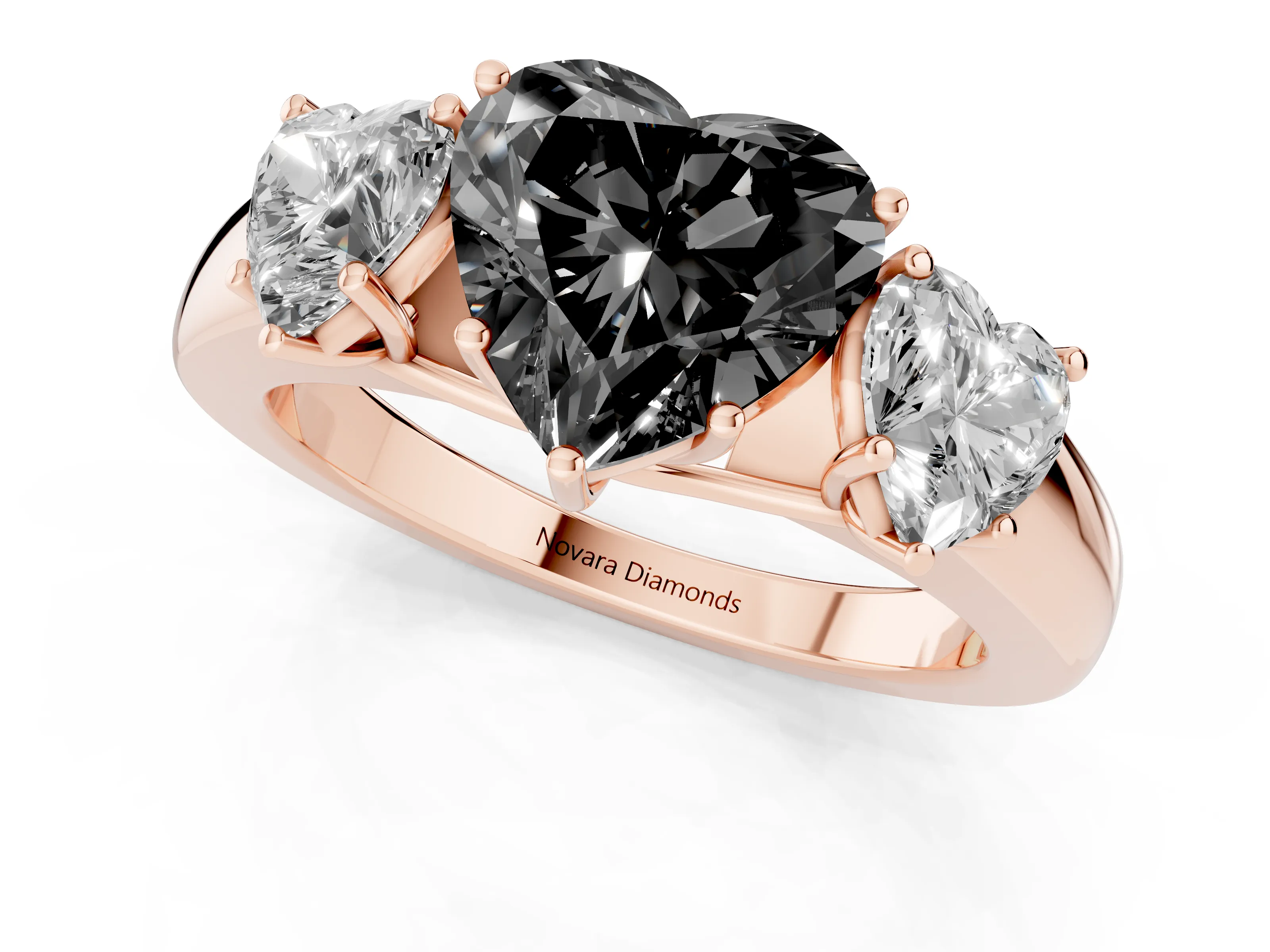 Fancy Black Three-Stone Heart Cut Diamond Ring Set in Rose gold with Matching Prong Settings and Plain Band