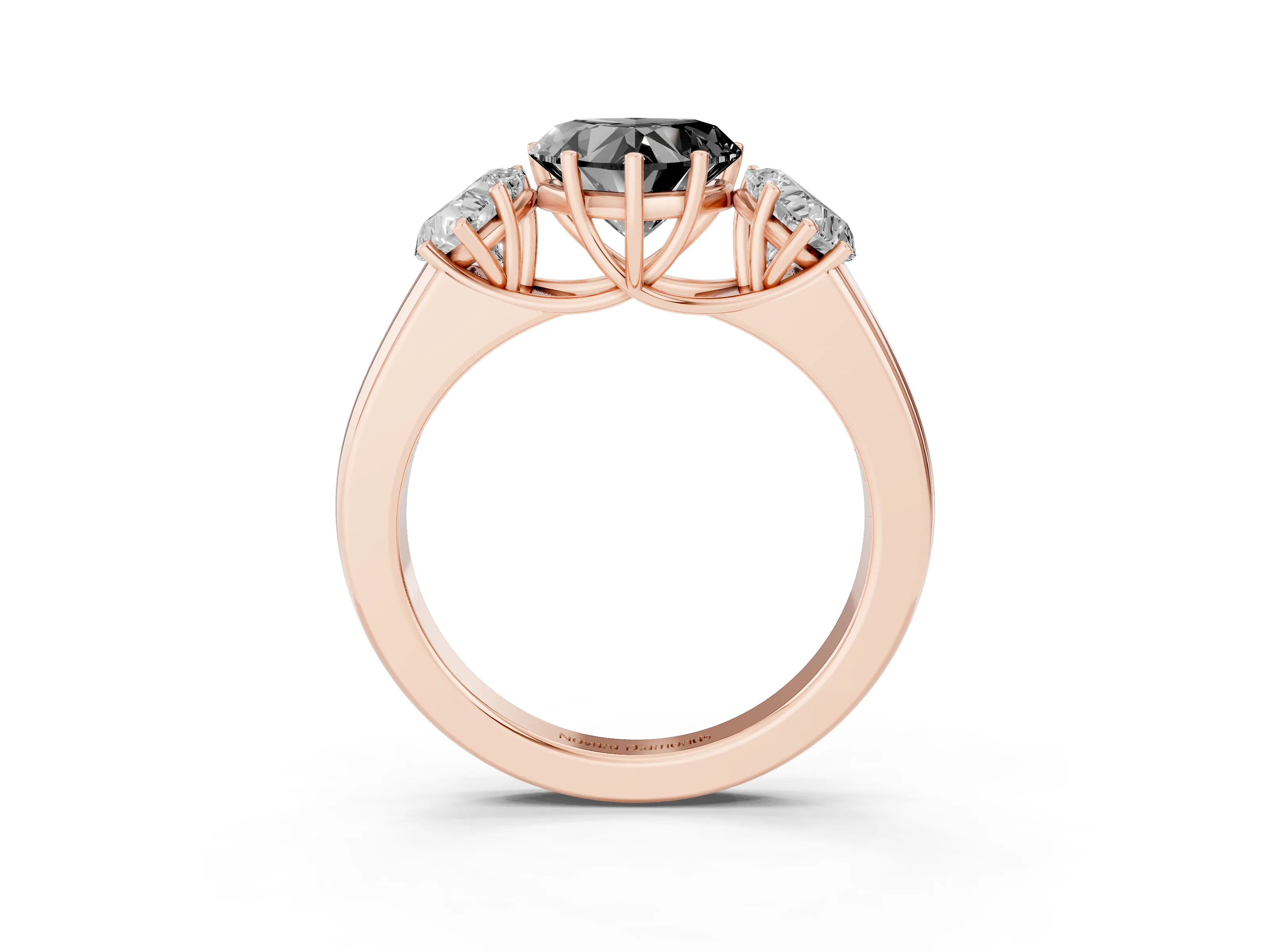 Fancy Black Three-Stone Heart Cut Diamond Ring Set in Rose gold with Matching Prong Settings and Plain Band