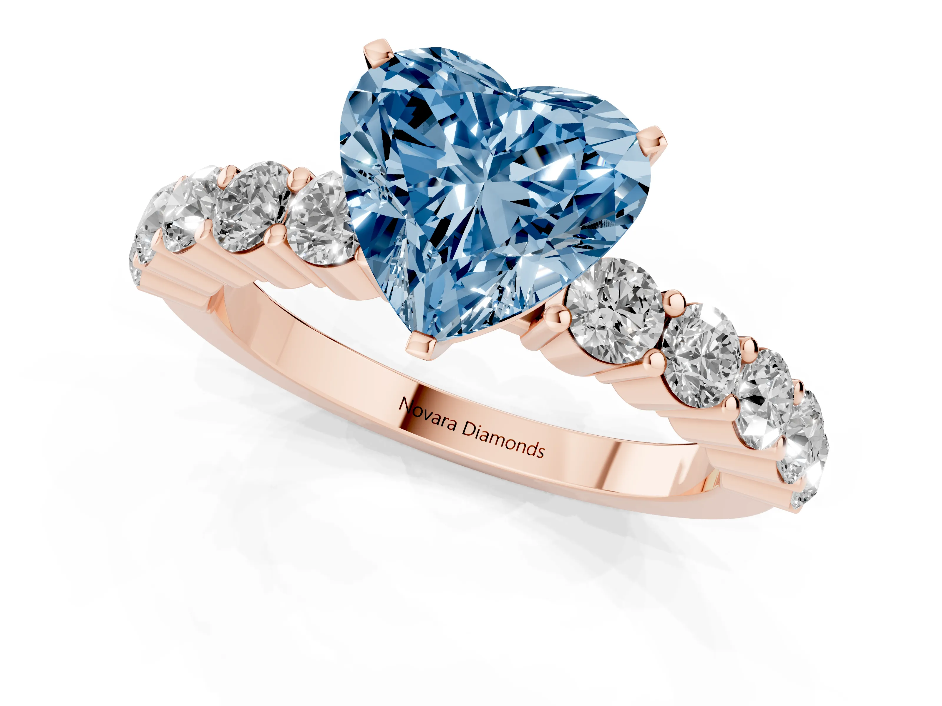 Fancy Blue Heart Cut Diamond Solitaire Ring Set in Rose gold with Shared Prong Round Side Stones