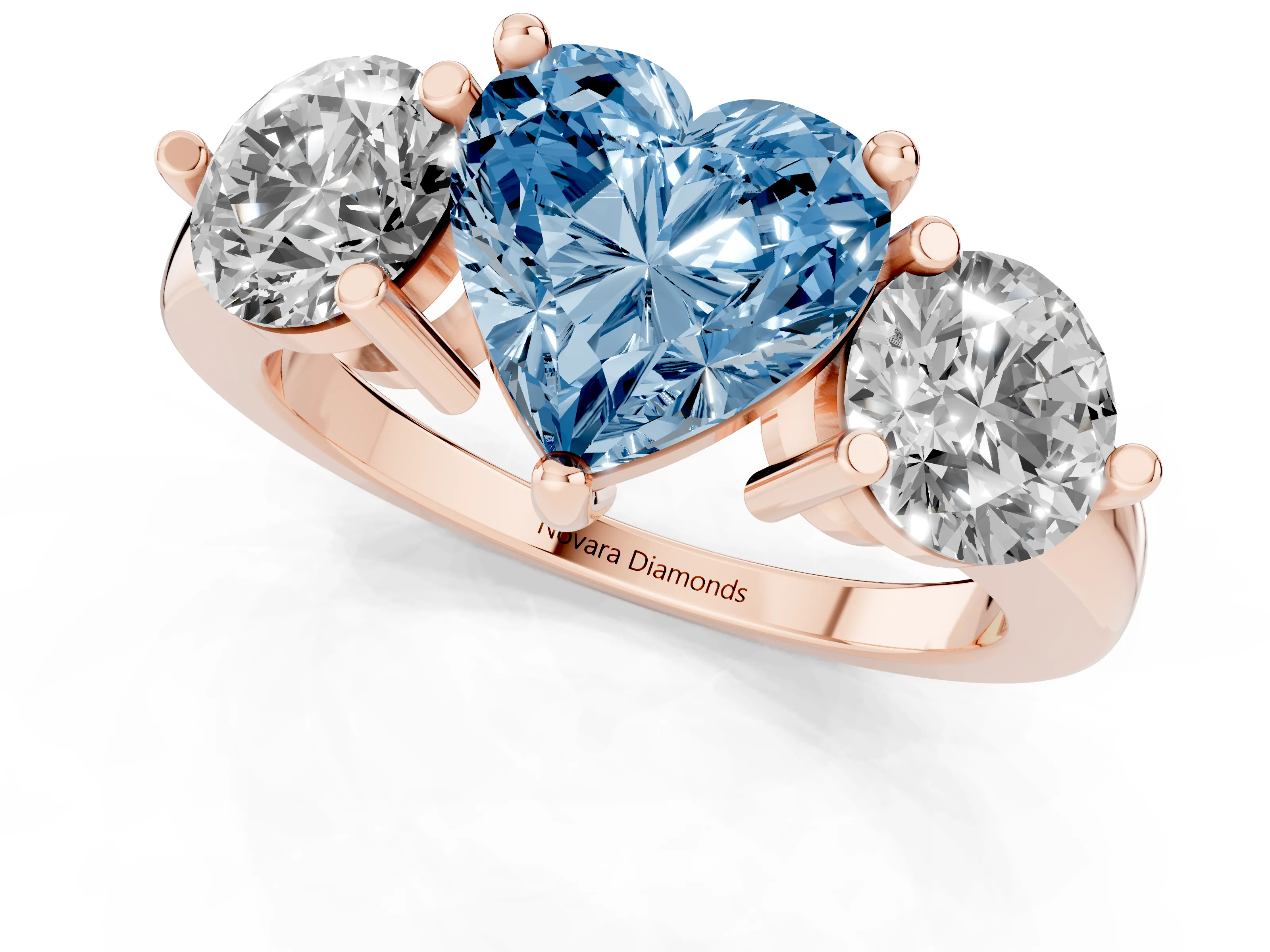 Fancy Blue Heart Cut Diamond Three-Stone Ring Set in Rose gold with Prong Setting and Classic Band
