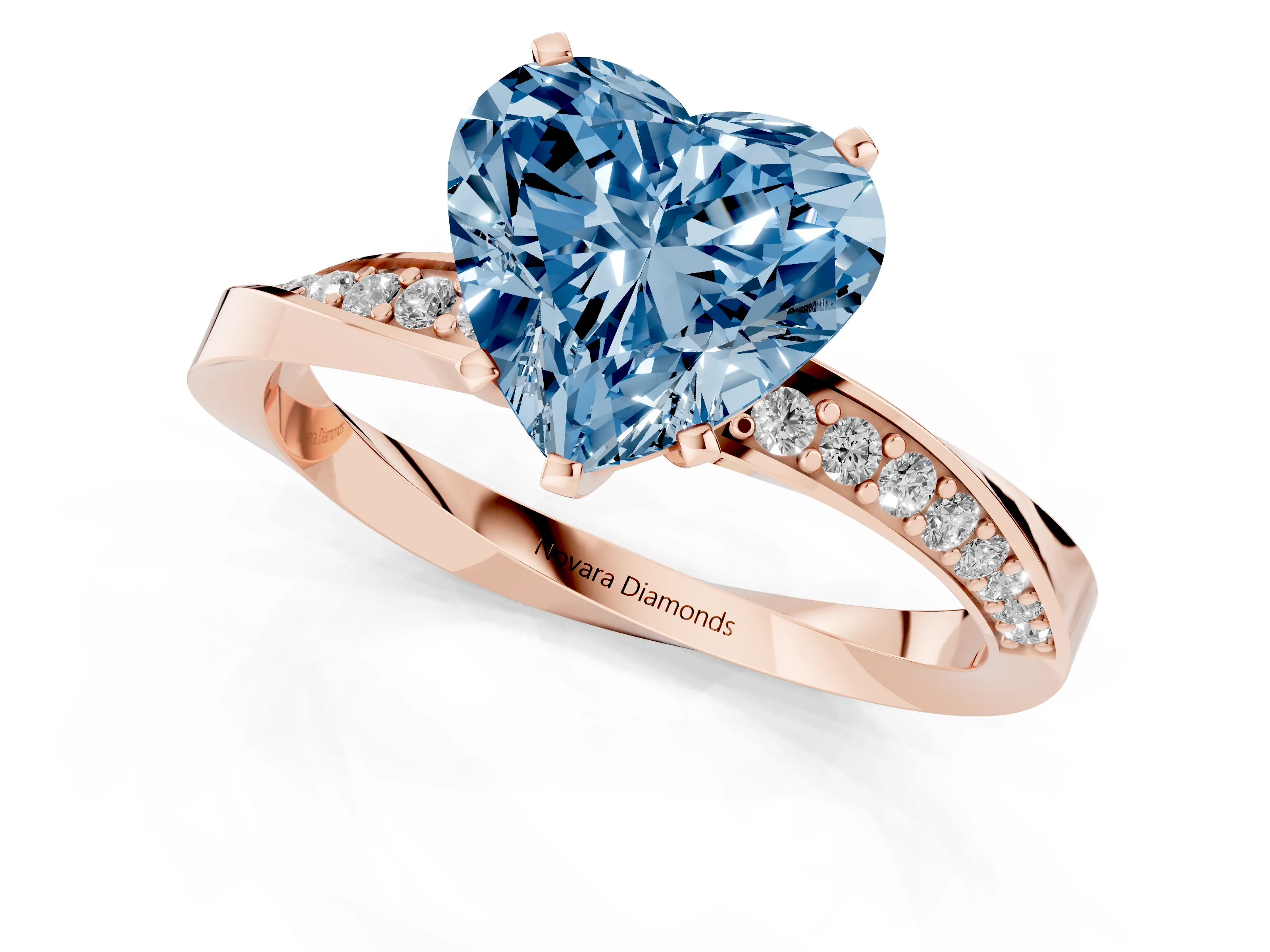 Fancy Blue Heart Cut Diamond Engagement Ring Set in Rose gold with Side Stone Accents and Prong Setting