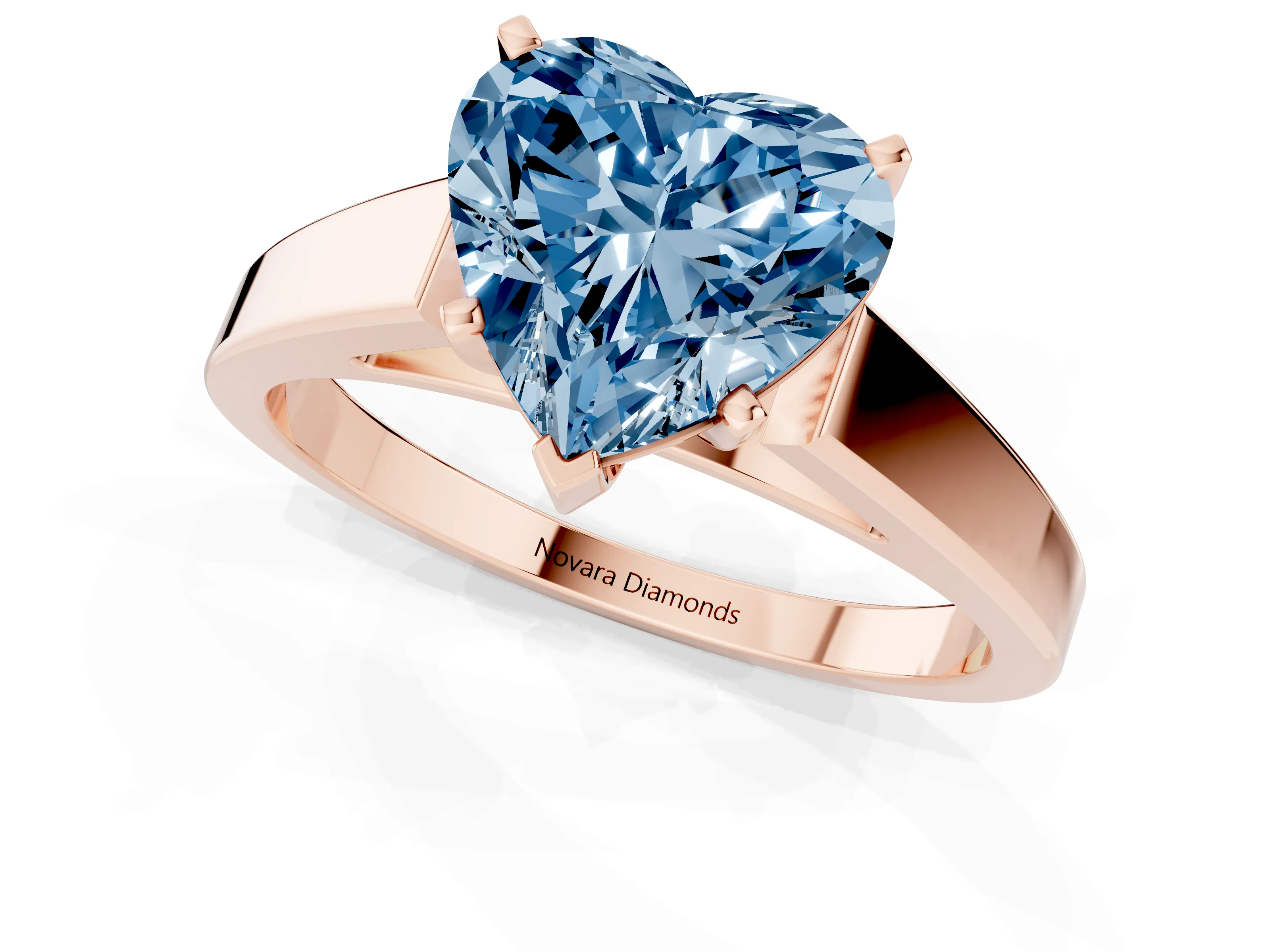Fancy Blue Heart Cut Diamond Solitaire Engagement Ring Set in Rose gold with Prong Setting and Tapered Band