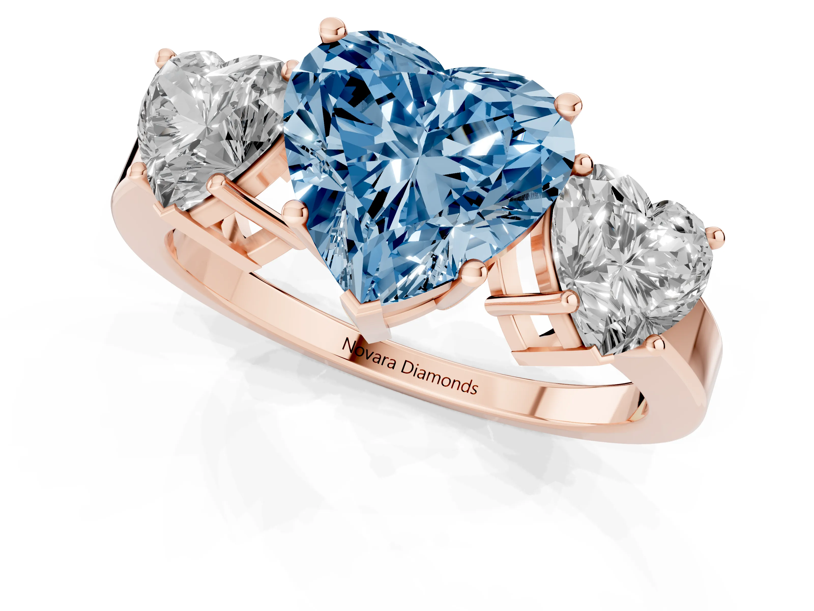 Fancy Blue Heart Cut Diamond Three-Stone Engagement Ring Set in Rose gold with Flat Band