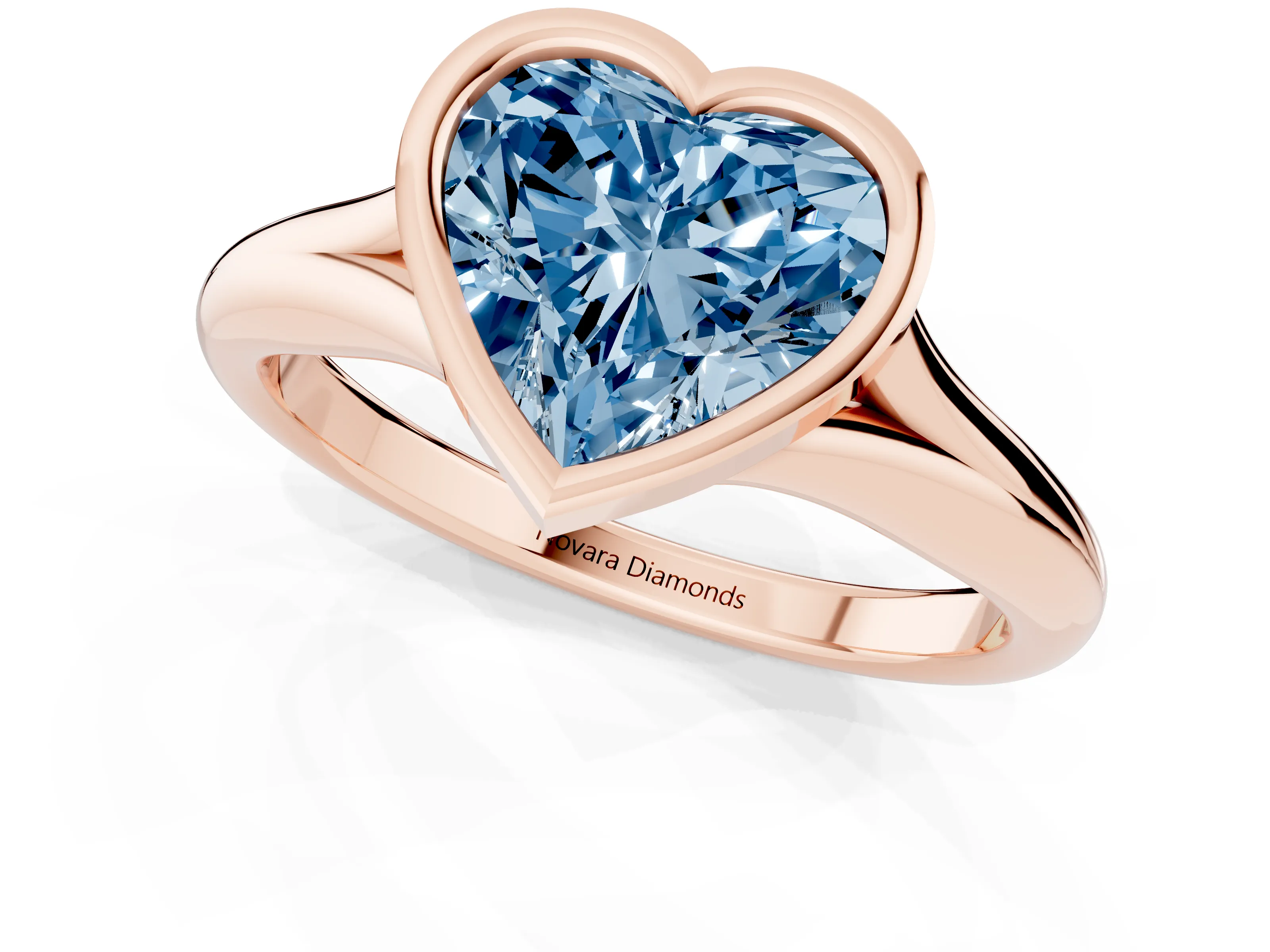 Fancy Blue Bezel Set Heart Cut Diamond Solitaire Ring Set in Rose gold with Smooth Band