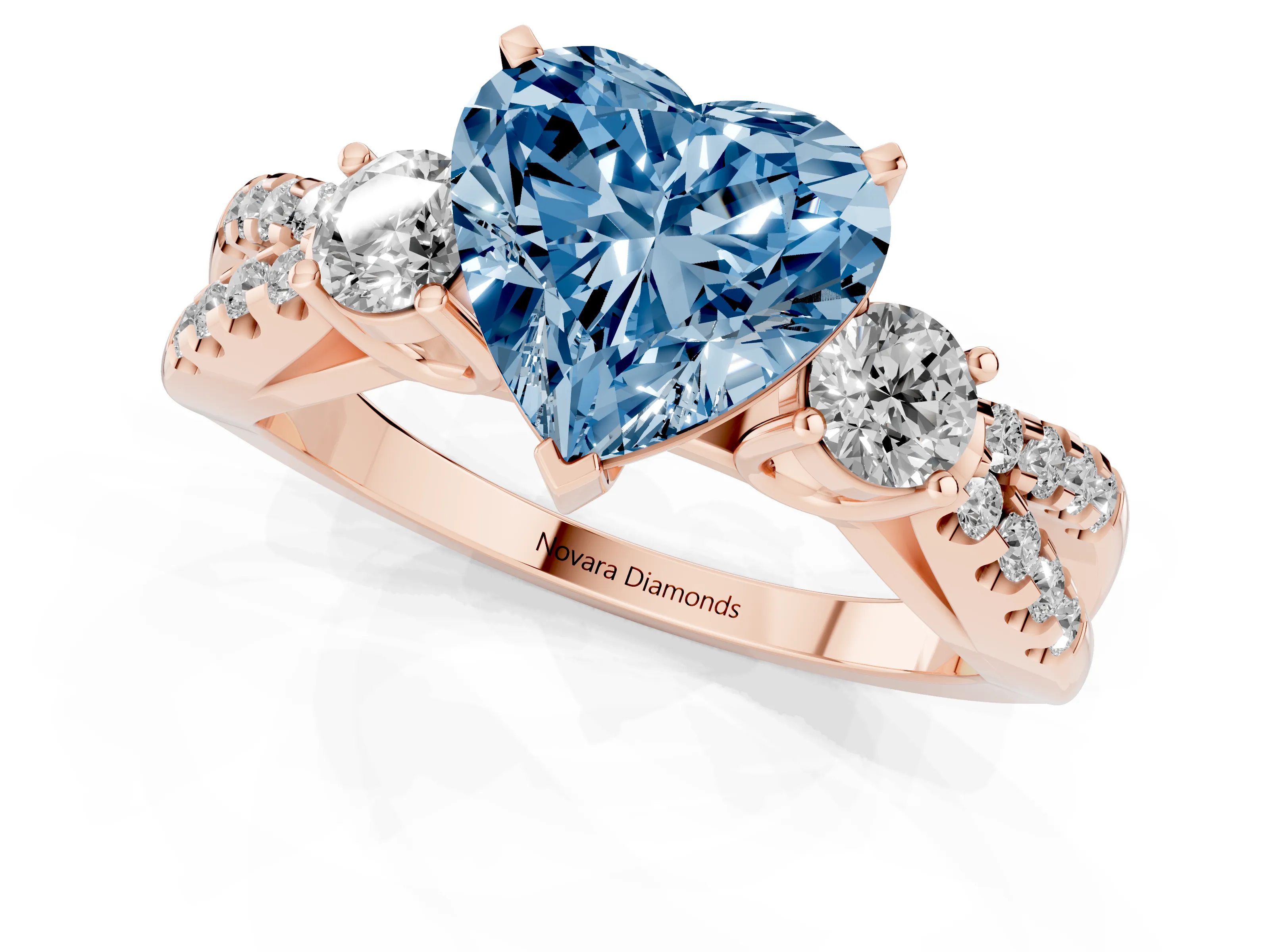 Fancy Blue Heart Cut Diamond Three-Stone Ring Set in Rose gold with Pavé Split Shank and Prong Setting