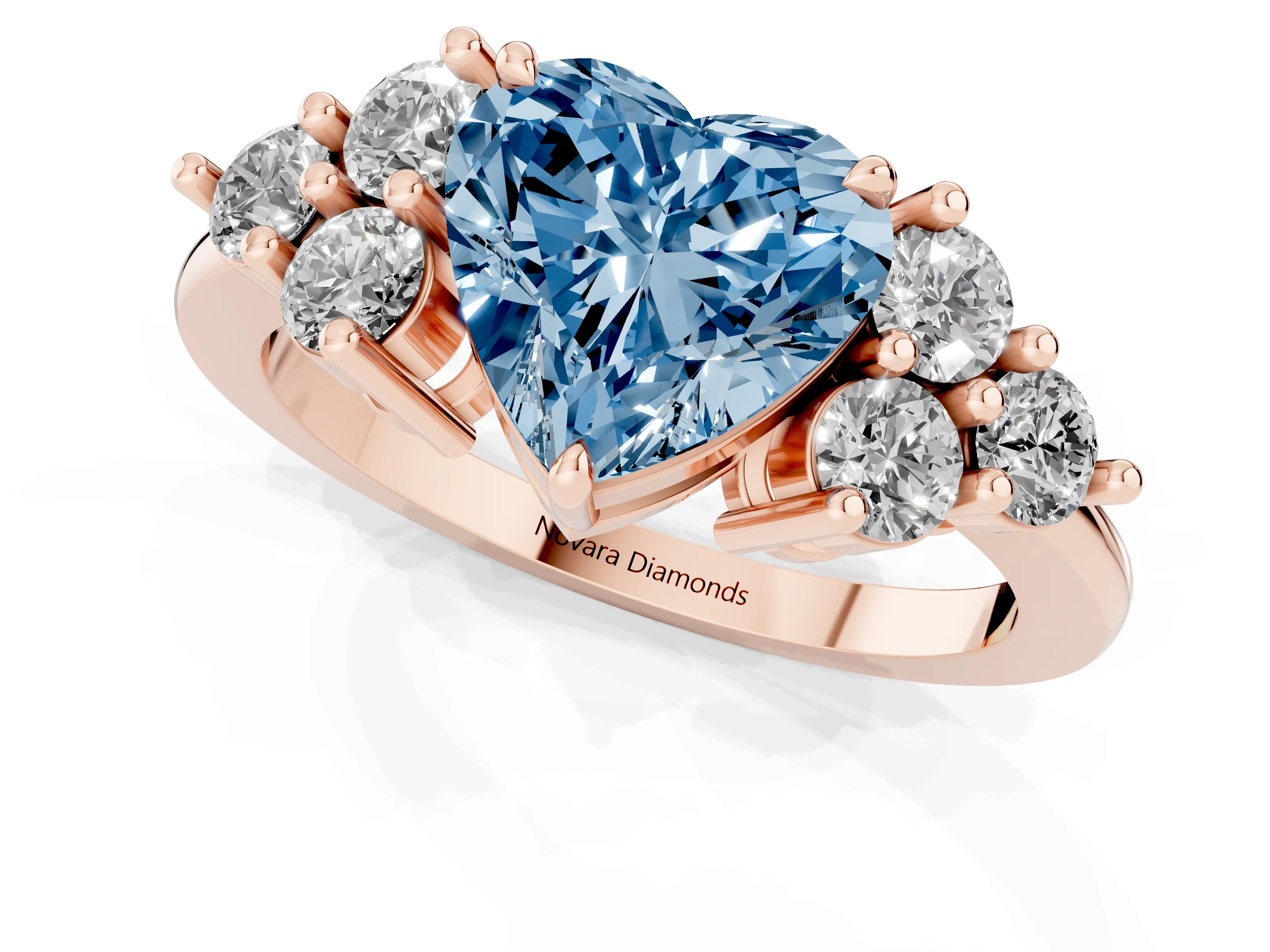 Fancy Blue Heart Cut Diamond Solitaire Ring Set in Rose gold with Cluster Accents on Each Side