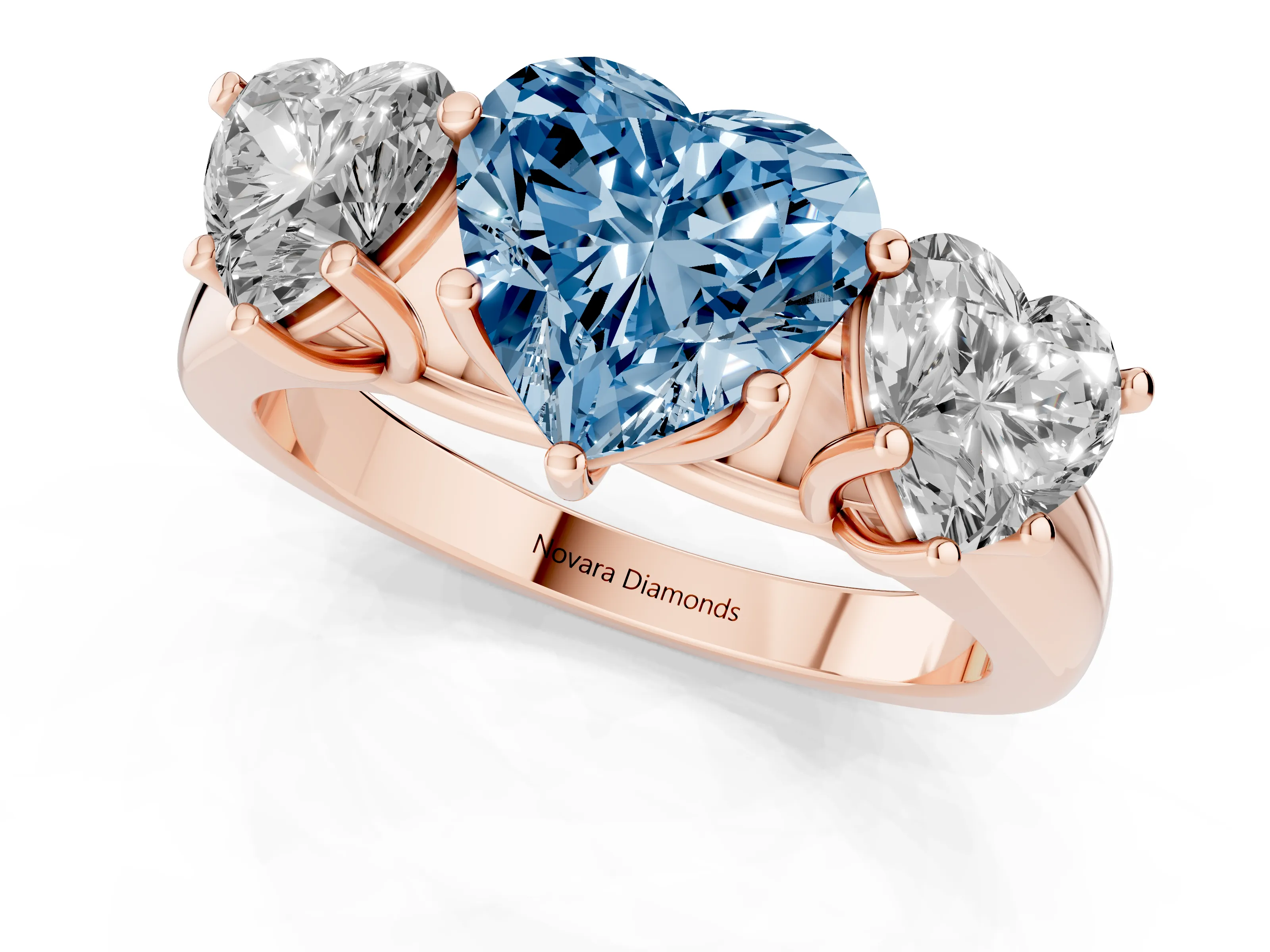 Fancy Blue Heart Cut Diamond Three-Stone Ring Set in Rose gold with Plain Polished Band
