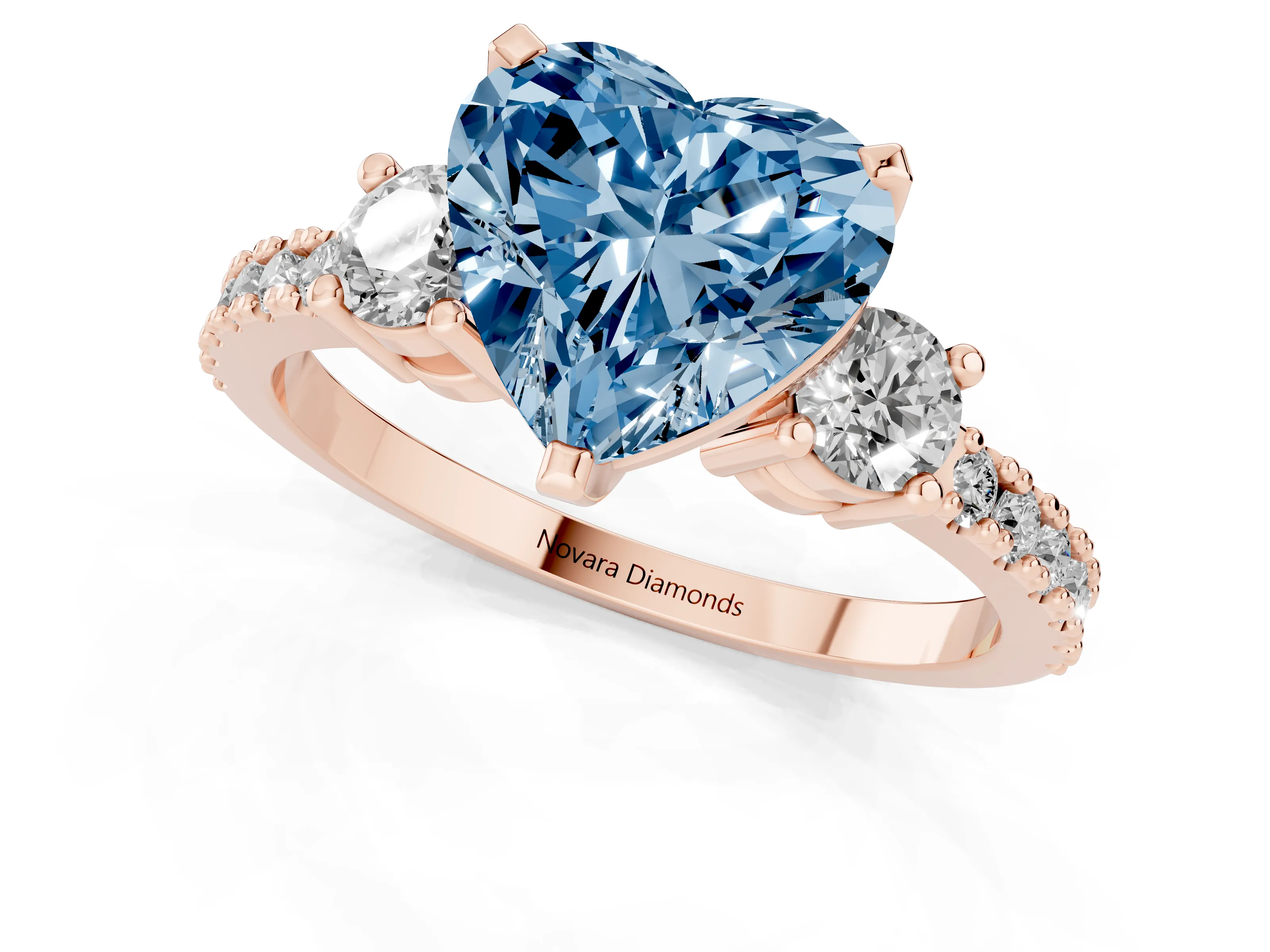 Fancy Blue Three-Stone Heart Cut Diamond Pavé Band Ring Set in Rose gold with Prong Setting