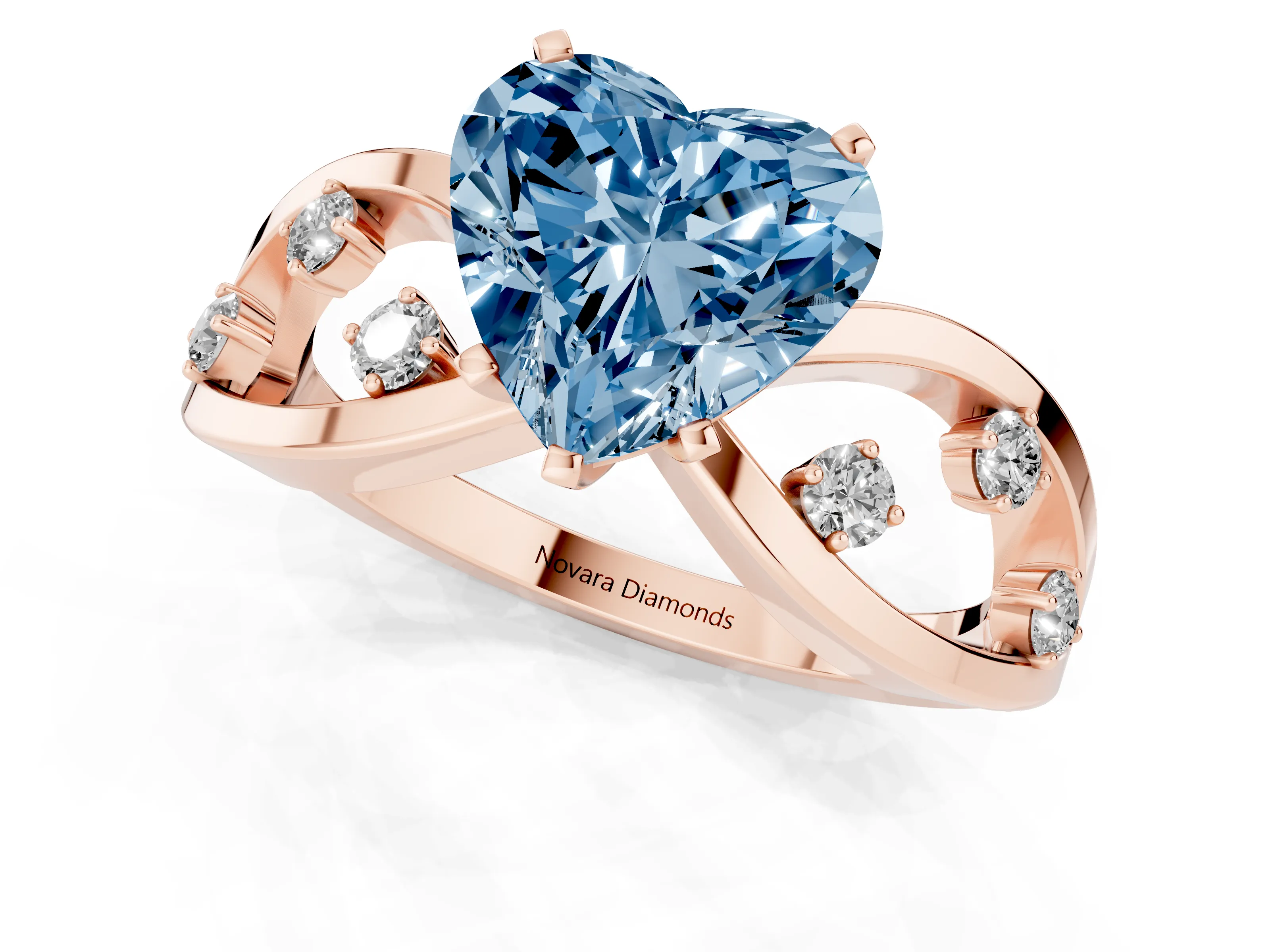 Fancy Blue Heart Cut Diamond Solitaire Ring Set in Rose gold with Side Stones on Criss-Cross Band and Prong Setting