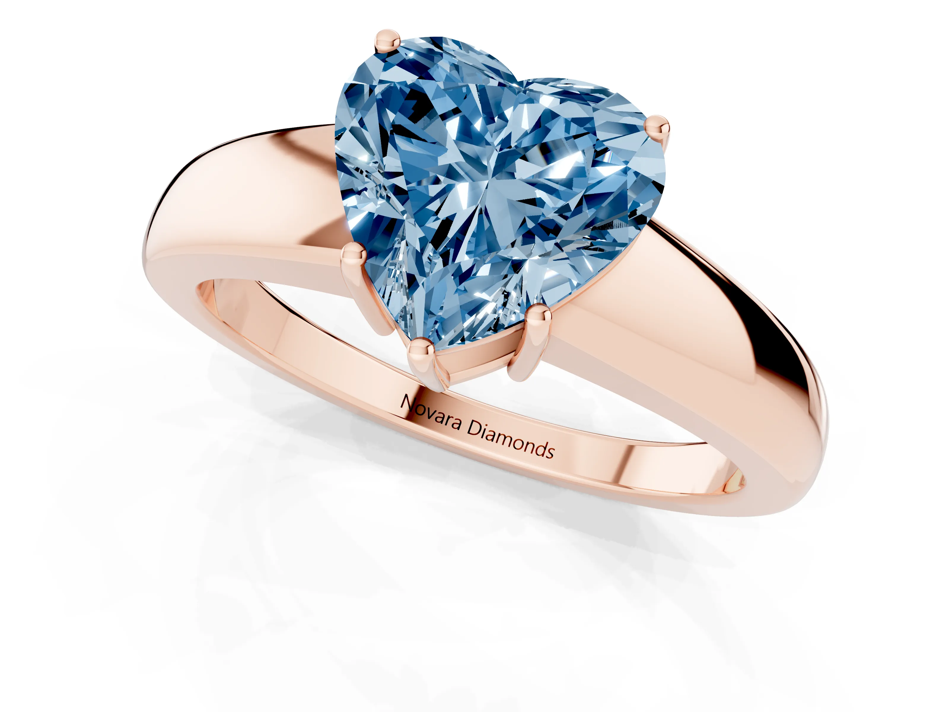 Fancy Blue Heart Cut Diamond Solitaire Ring Set in Rose gold with Tapered Band and Prong Setting