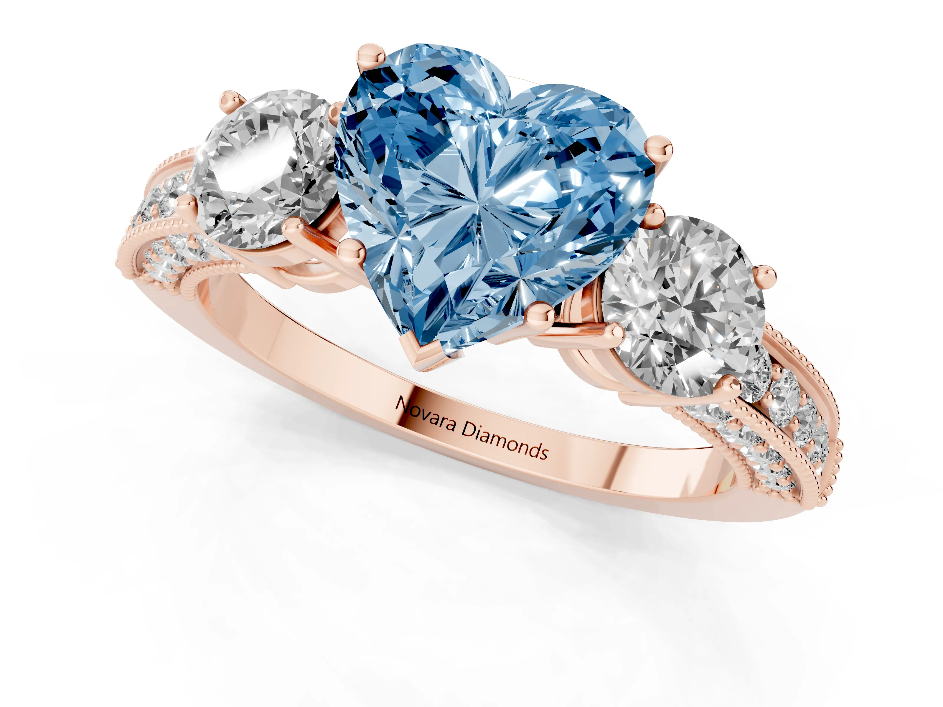 Fancy Blue Heart Cut Diamond Three-Stone Ring Set in Rose gold with Round Side Stones and Pavé Band