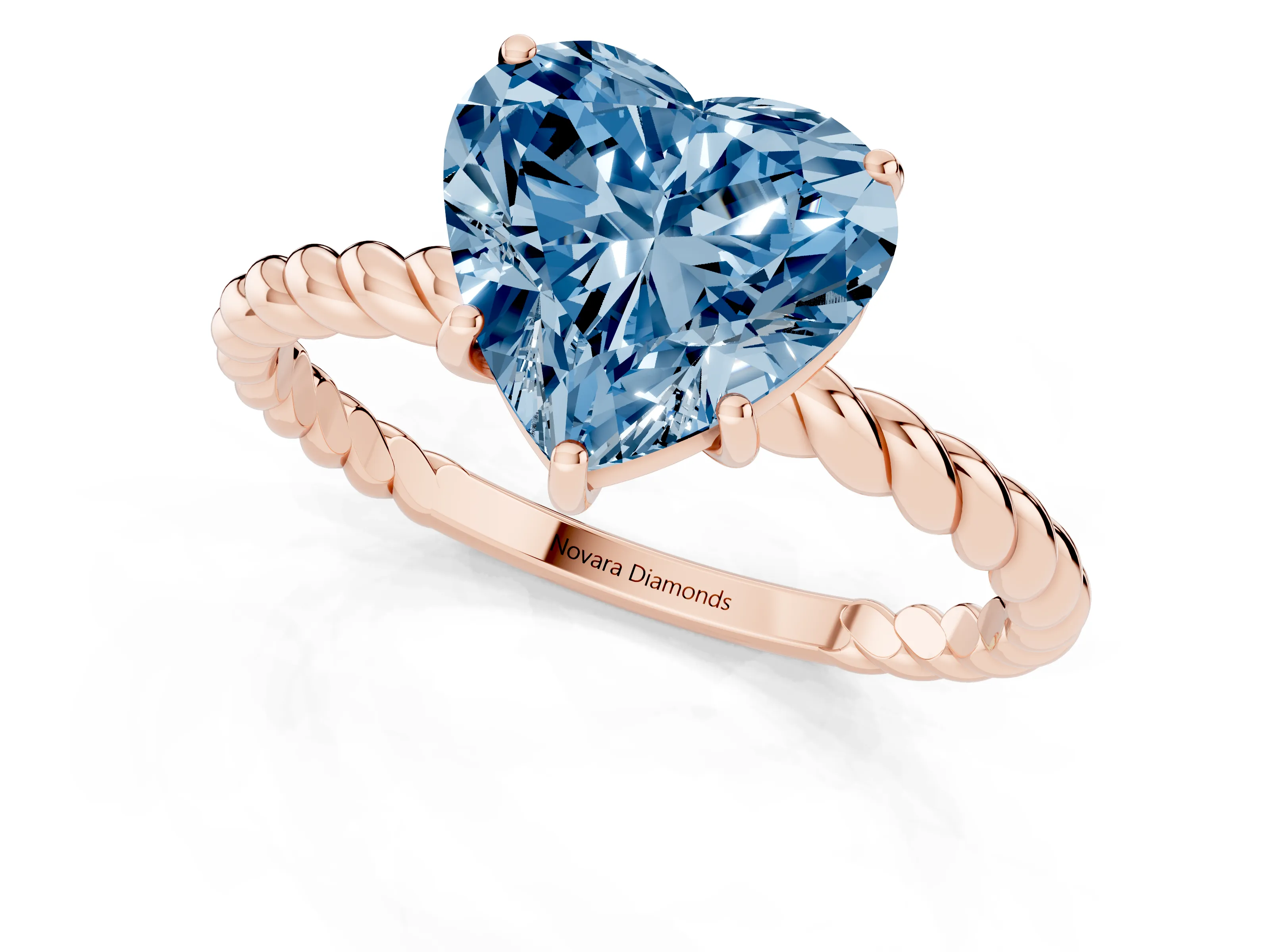 Fancy Blue Heart Cut Diamond Solitaire Ring Set in Rose gold with Twist Band and Prong Setting