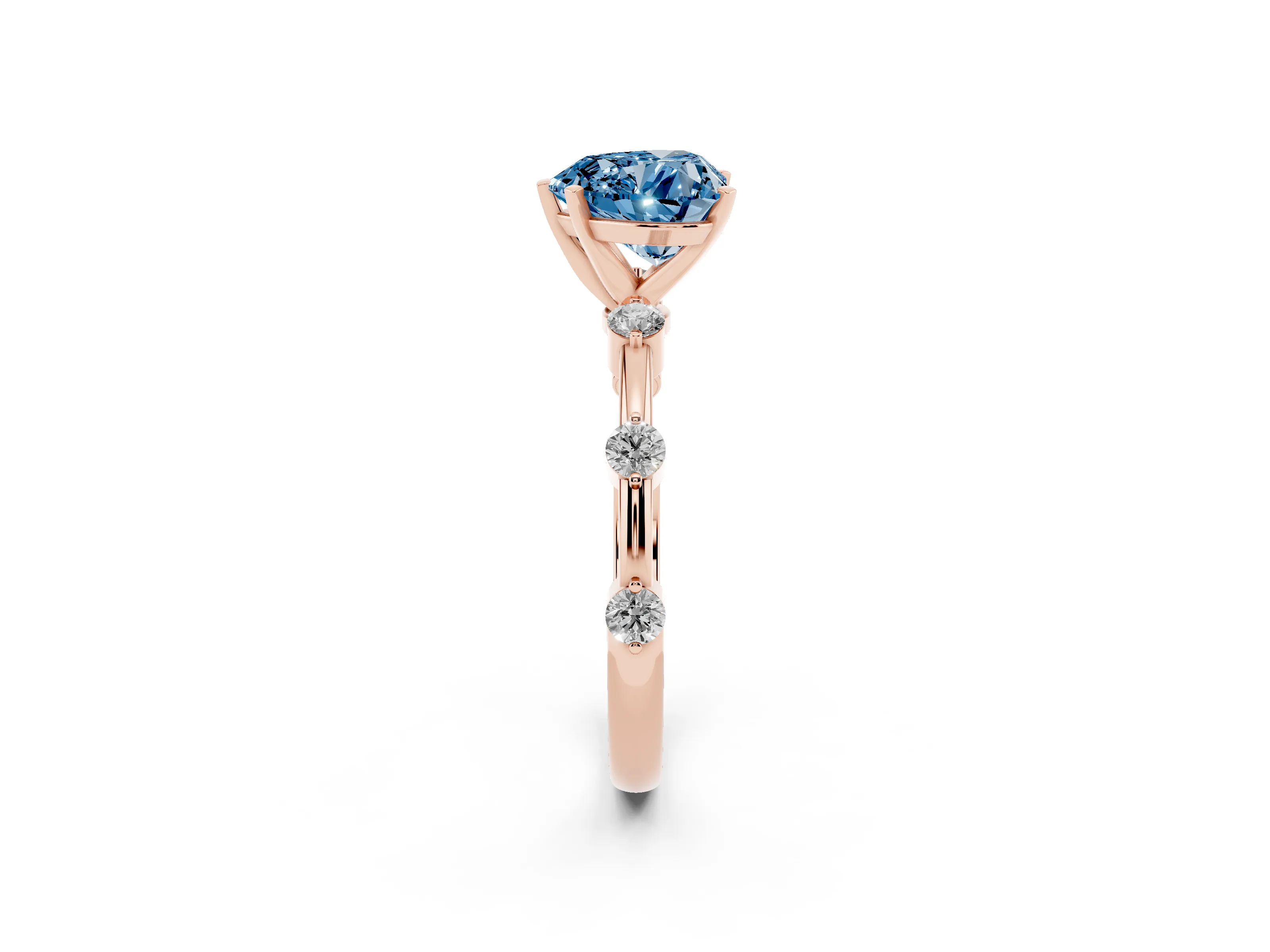 Fancy Blue Heart Cut Diamond Solitaire Ring Set in Rose gold with Bezel Set Side Stones and Prong Setting
