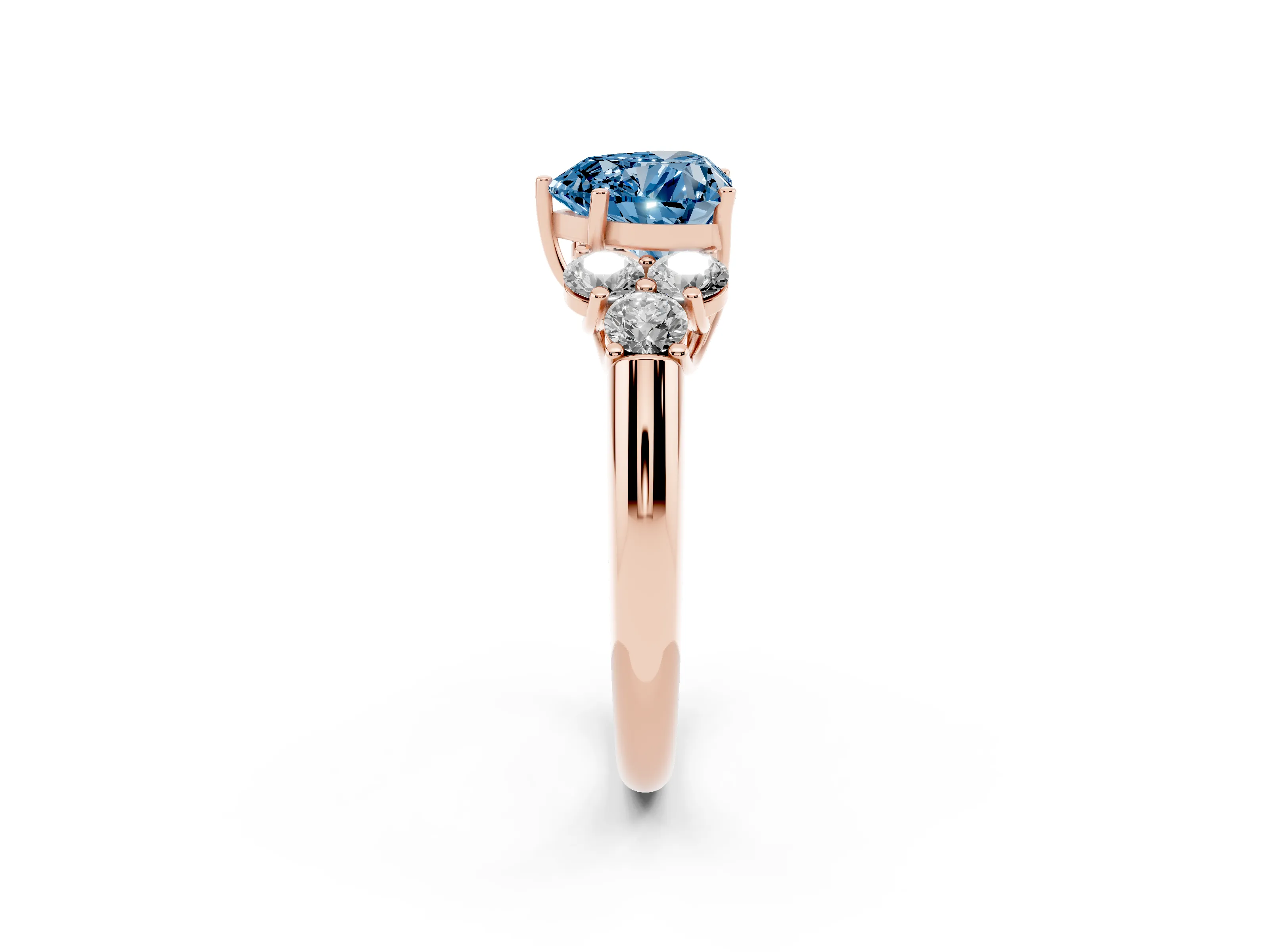 Fancy Blue Heart Cut Diamond Cluster Ring Set in Rose gold with Round Accent Stones and Prong Setting on a Plain Band