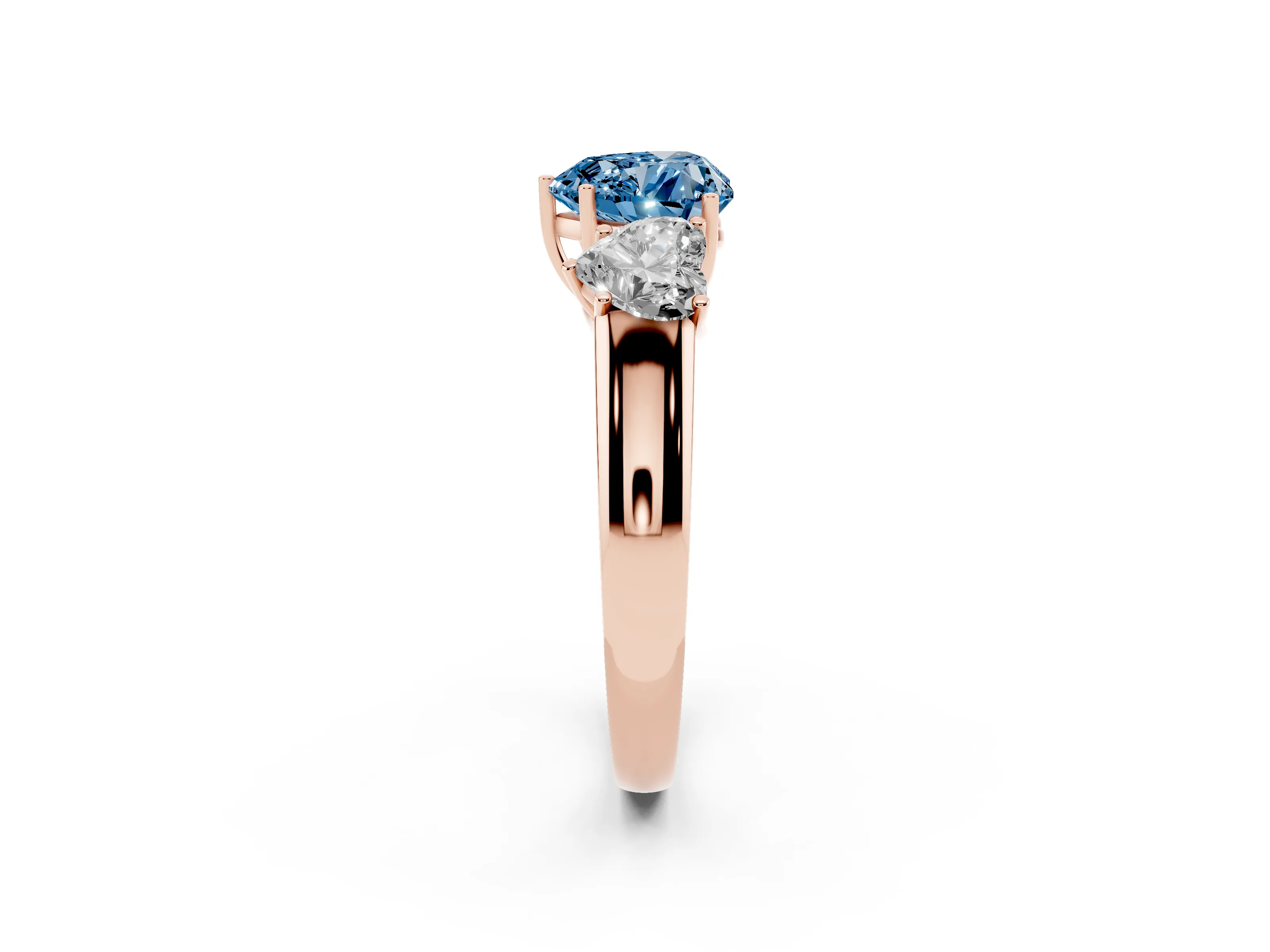 Fancy Blue Three-Stone Heart Cut Diamond Ring Set in Rose gold with Matching Prong Settings and Plain Band