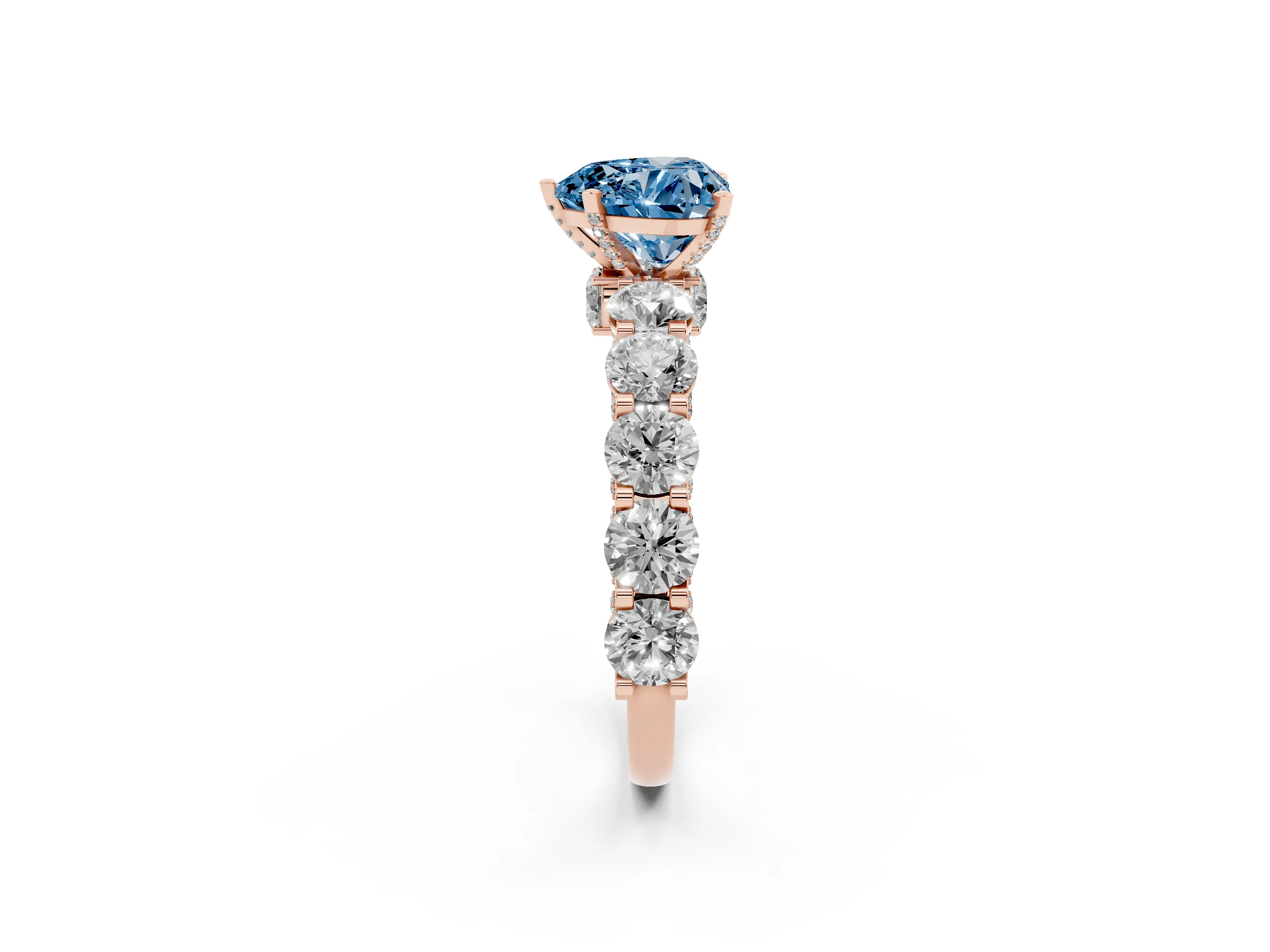 Fancy Blue Heart Cut Diamond Side Stone Ring Set in Rose gold with Alternating Round and Oval Side Stones