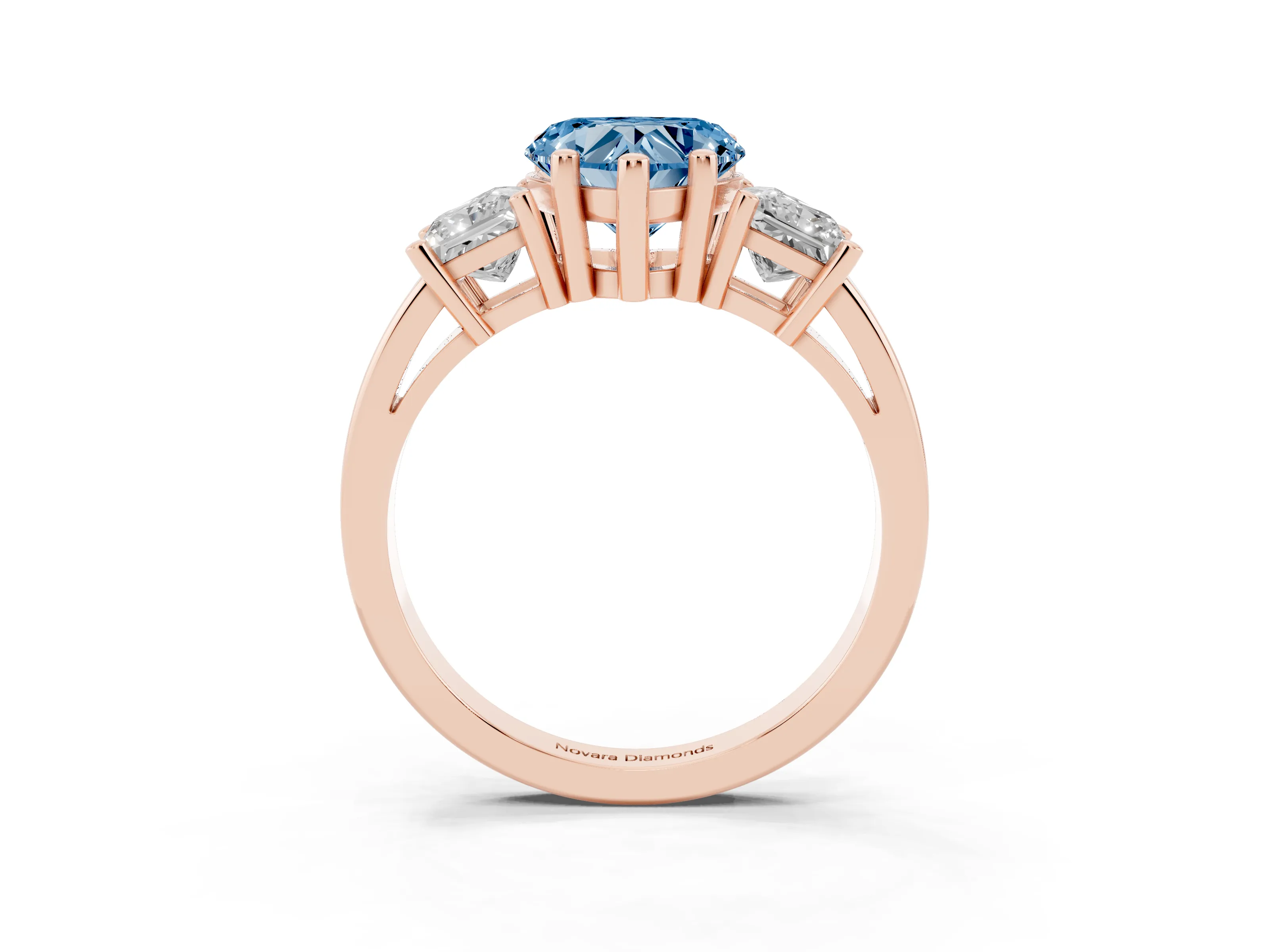 Fancy Blue Three-Stone Heart Cut Diamond Solitaire Ring Set in Rose gold with Prong Setting