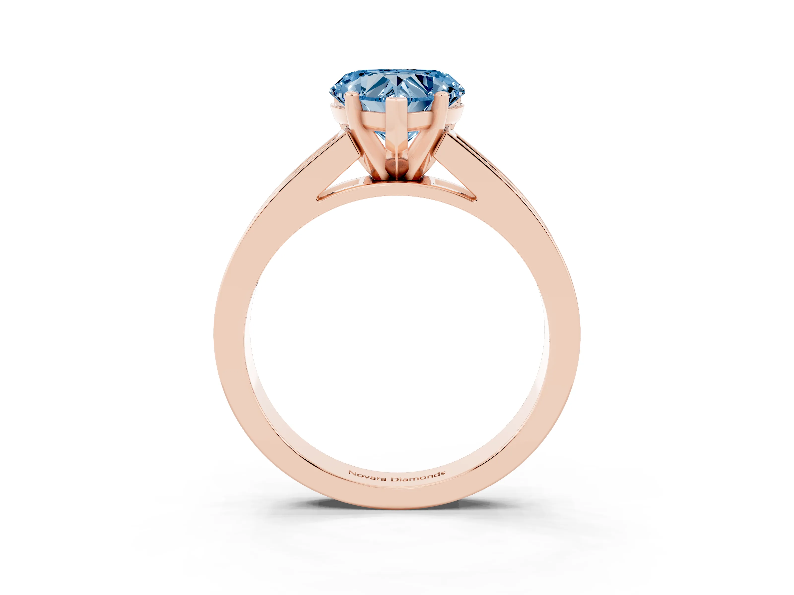 Fancy Blue Heart Cut Diamond Solitaire Ring Set in Rose gold with Channel-Set Band and Prong Setting