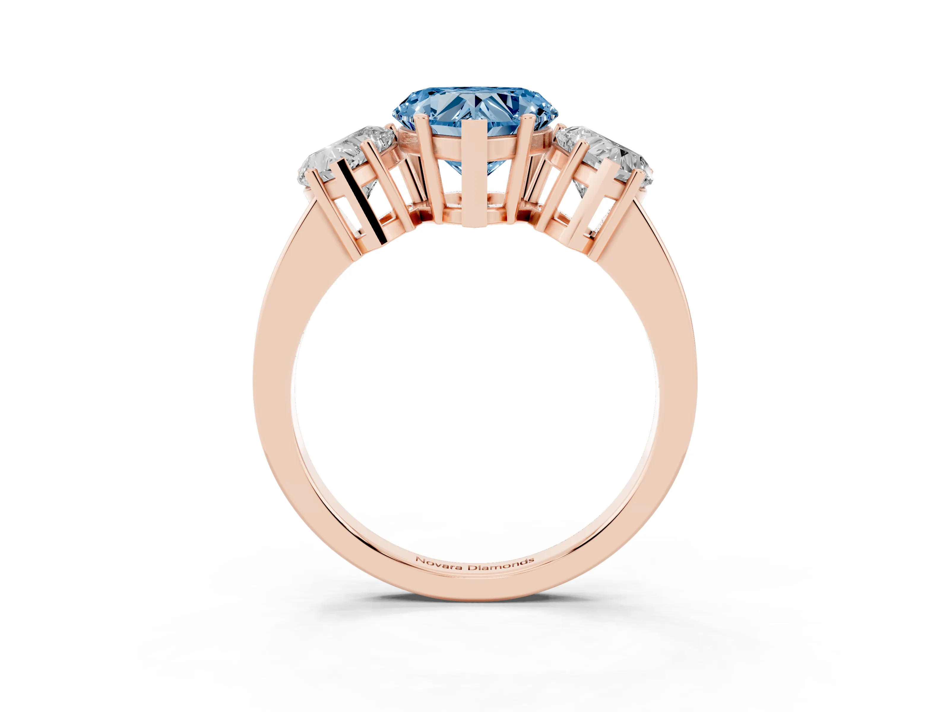 Fancy Blue Heart Cut Diamond Three-Stone Engagement Ring Set in Rose gold with Flat Band