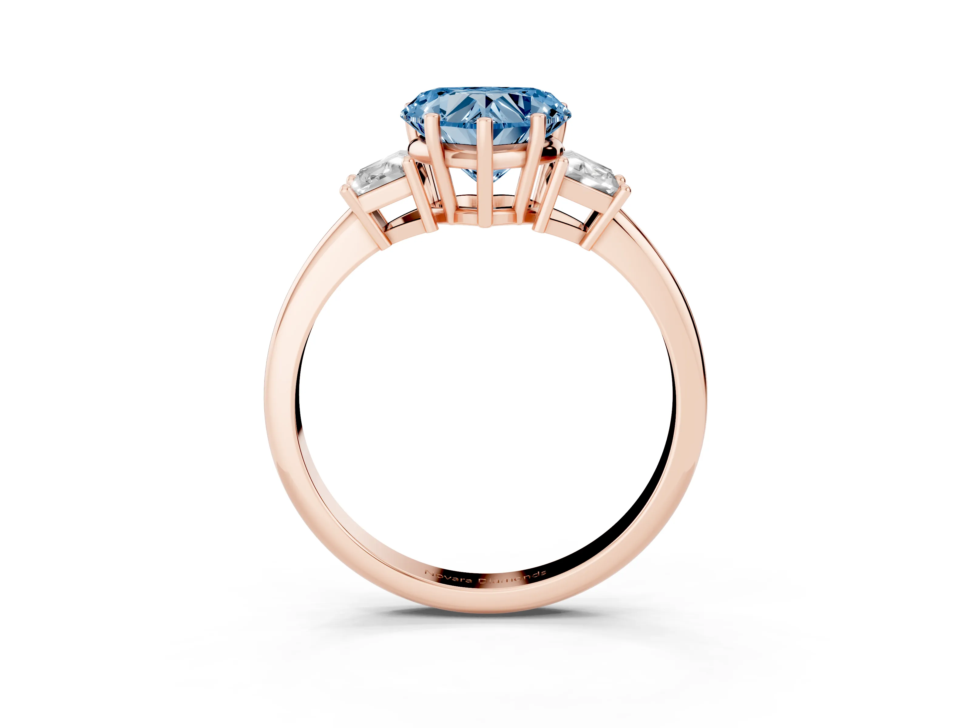 Fancy Blue Heart Cut Diamond Three-Stone Ring Set in Rose gold with Trapezoid Side Stones and Prong Setting