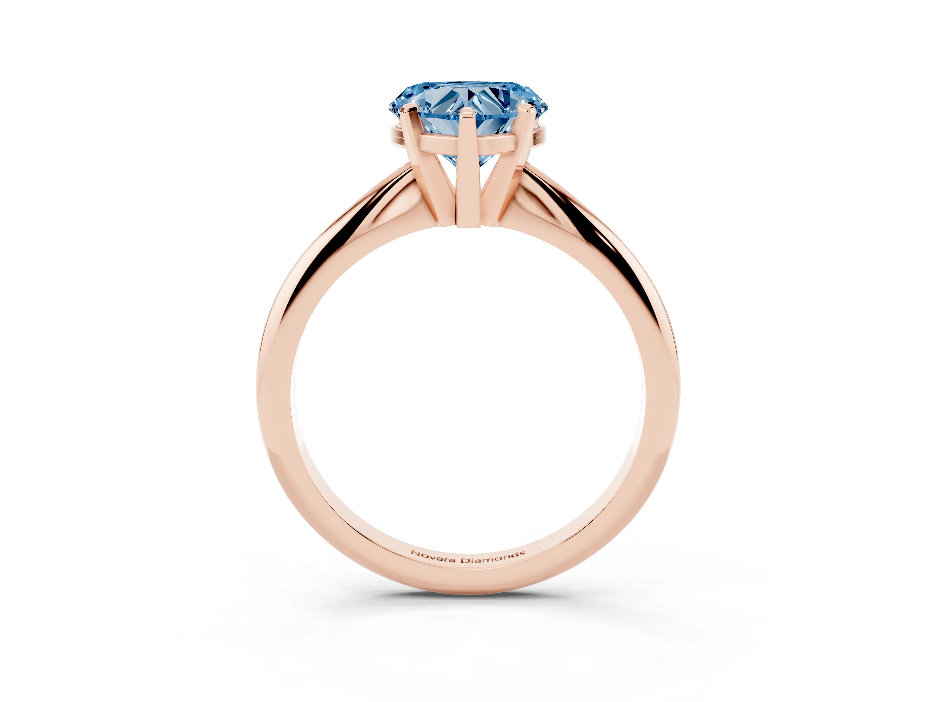 Fancy Blue Heart Cut Diamond Solitaire Ring Set in Rose gold with Prong Setting on a Plain Round Band