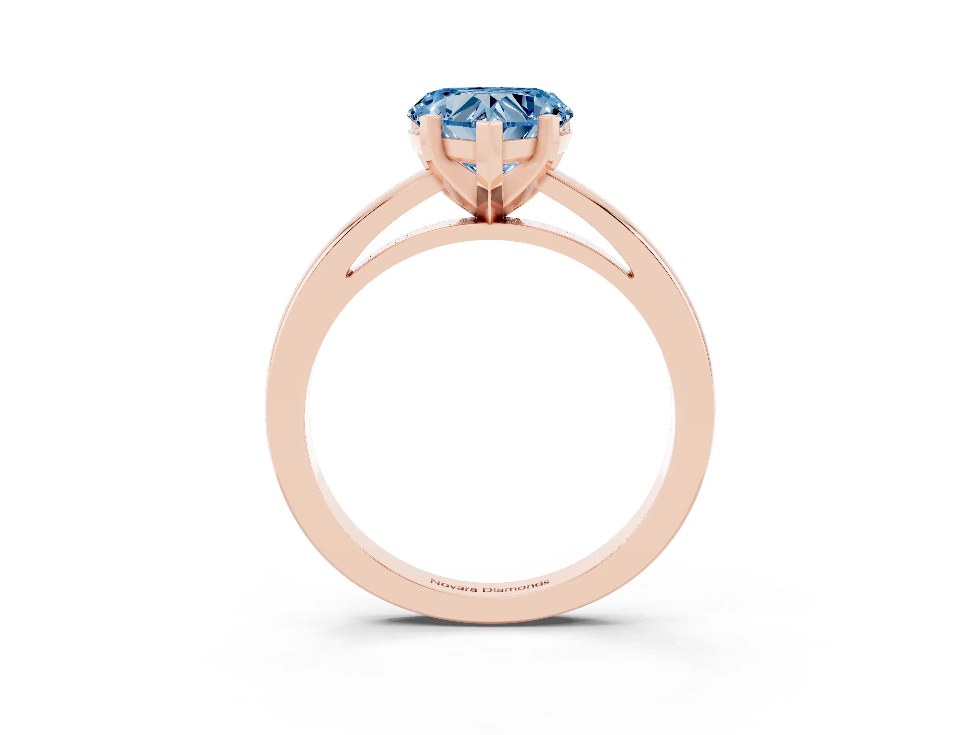 Fancy Blue Heart Cut Diamond Solitaire Engagement Ring Set in Rose gold with Prong Setting on a Classic Band