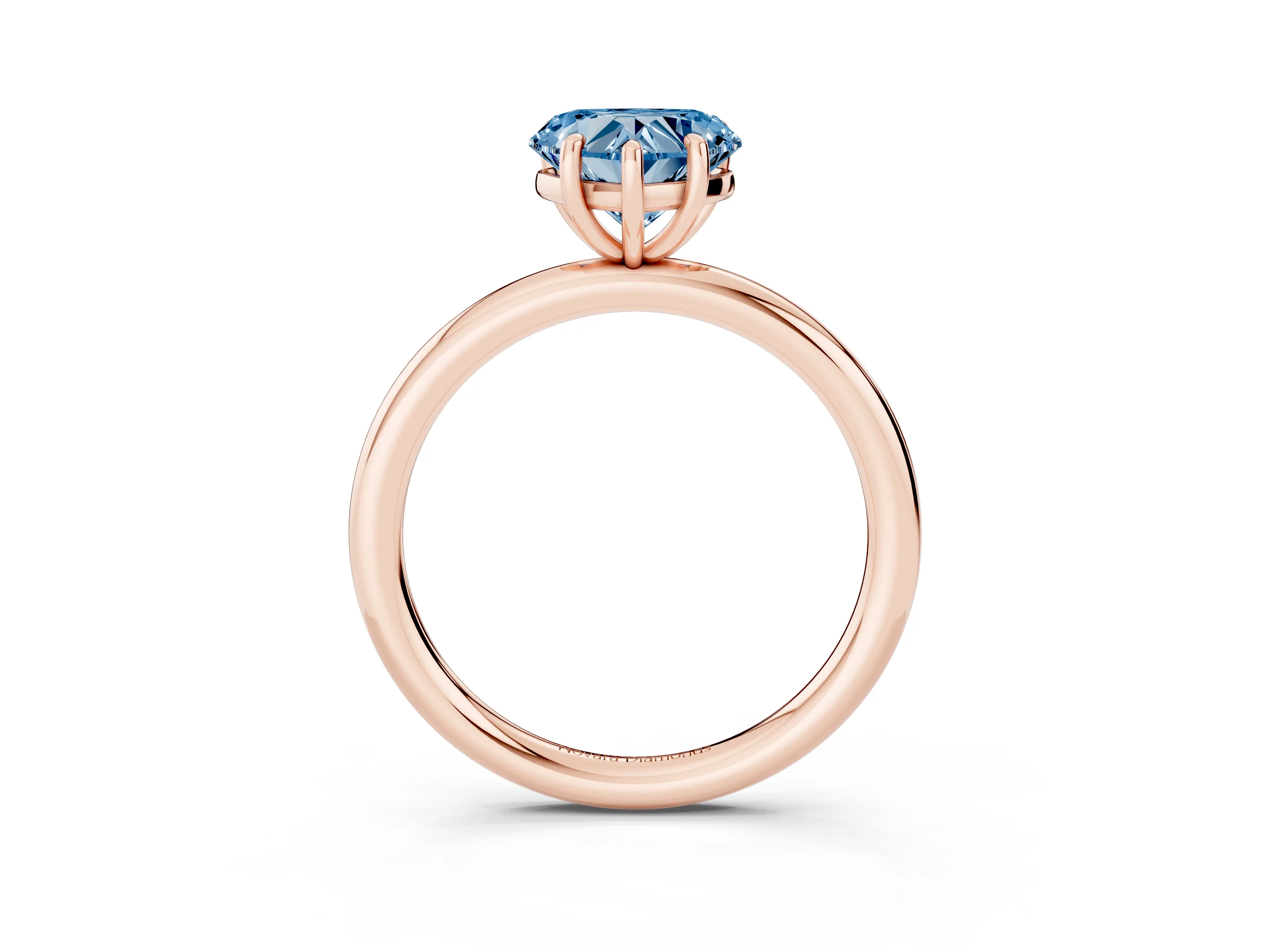 Fancy Blue Heart Cut Diamond Solitaire Ring Set in Rose gold with Prong Setting on a Polished Plain Band