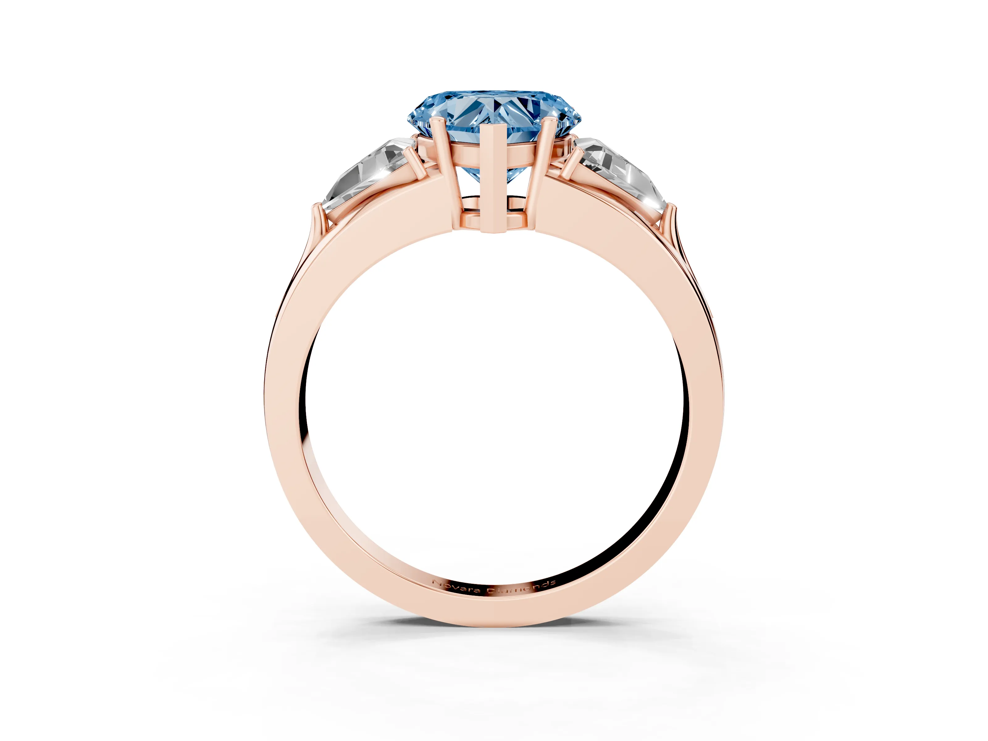 Fancy Blue Heart Cut Diamond Three-Stone Ring Set in Rose gold with Trillion Side Stones and Split Shank