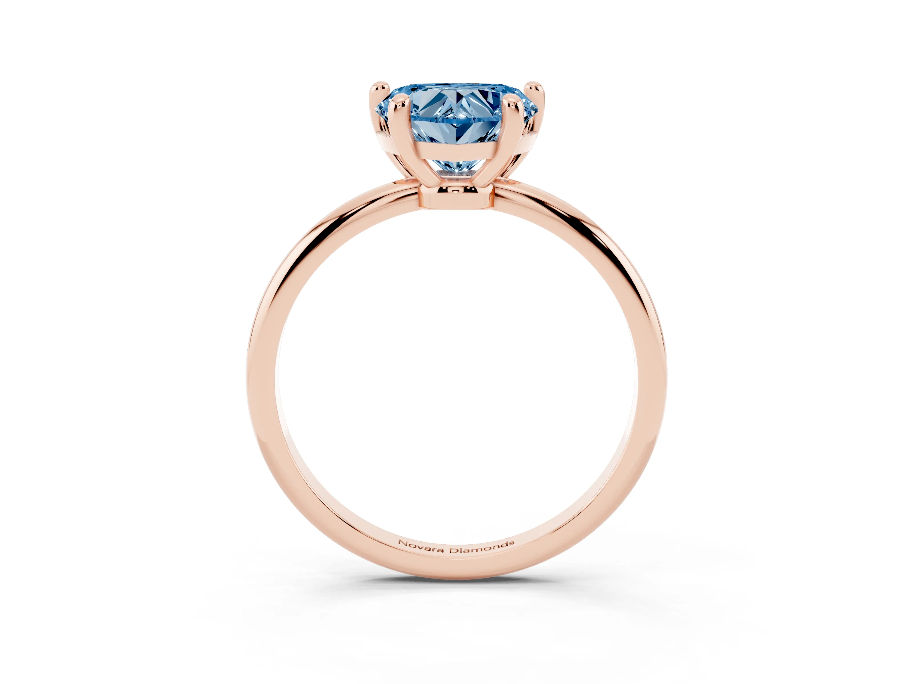 Fancy Blue Heart Cut Diamond Solitaire Ring Set in Rose gold with Secure Prong Setting on a Classic Band