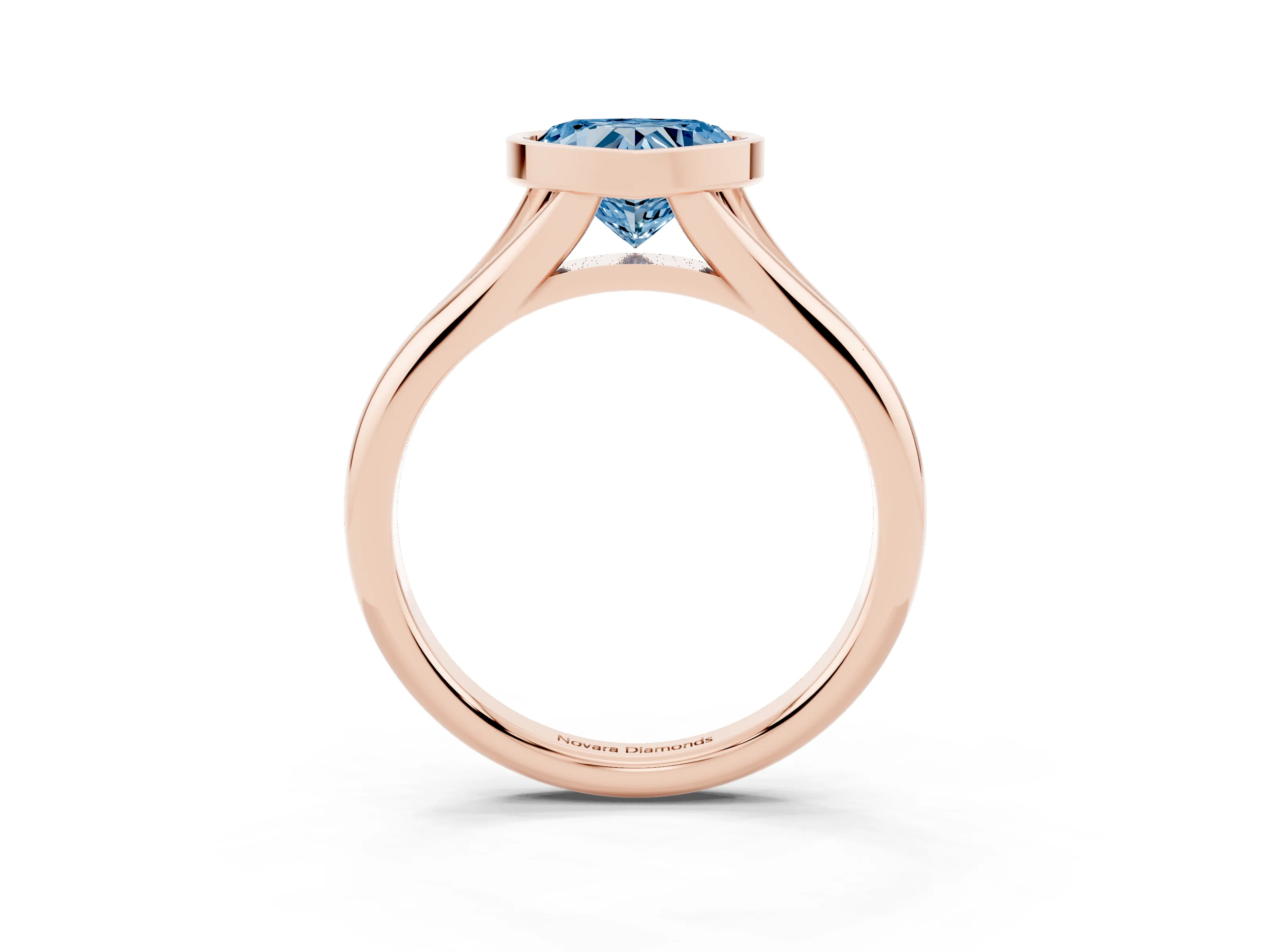 Fancy Blue Bezel Set Heart Cut Diamond Solitaire Ring Set in Rose gold with Smooth Band