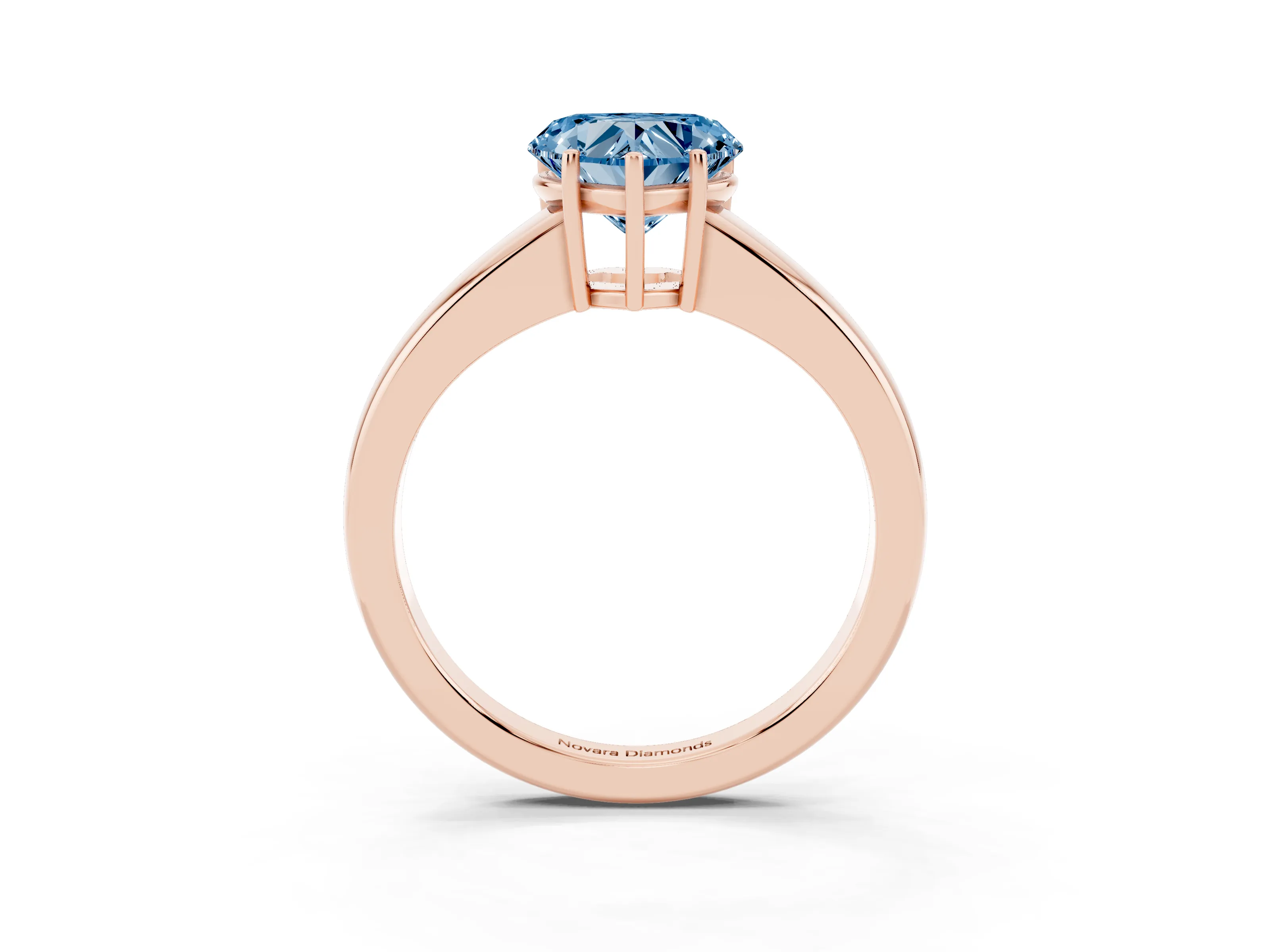 Fancy Blue Heart Cut Diamond Solitaire Ring Set in Rose gold with Tapered Band and Prong Setting