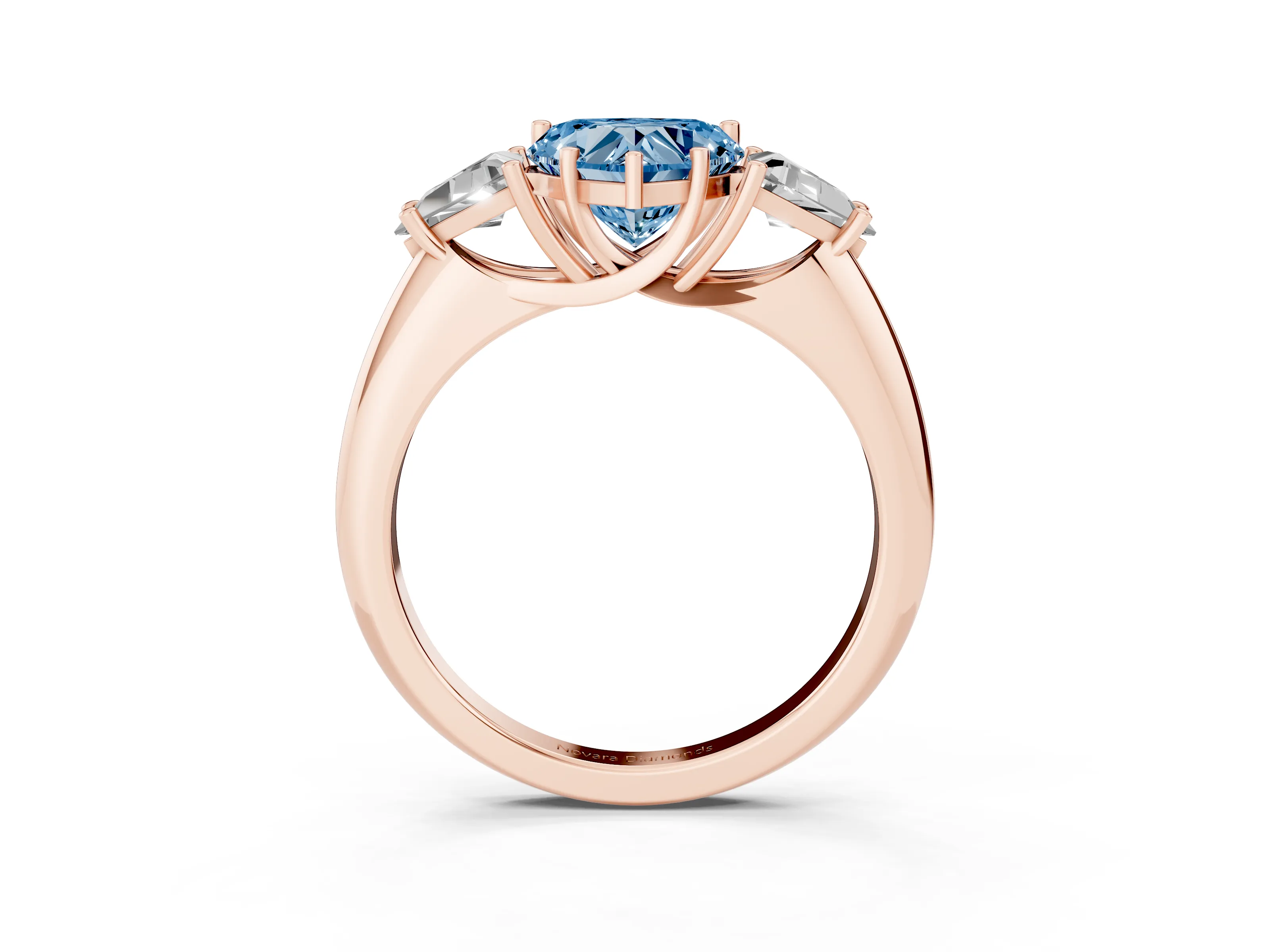 Fancy Blue Heart Cut Diamond Three-Stone Engagement Ring Set in Rose gold with Trillion Side Stones