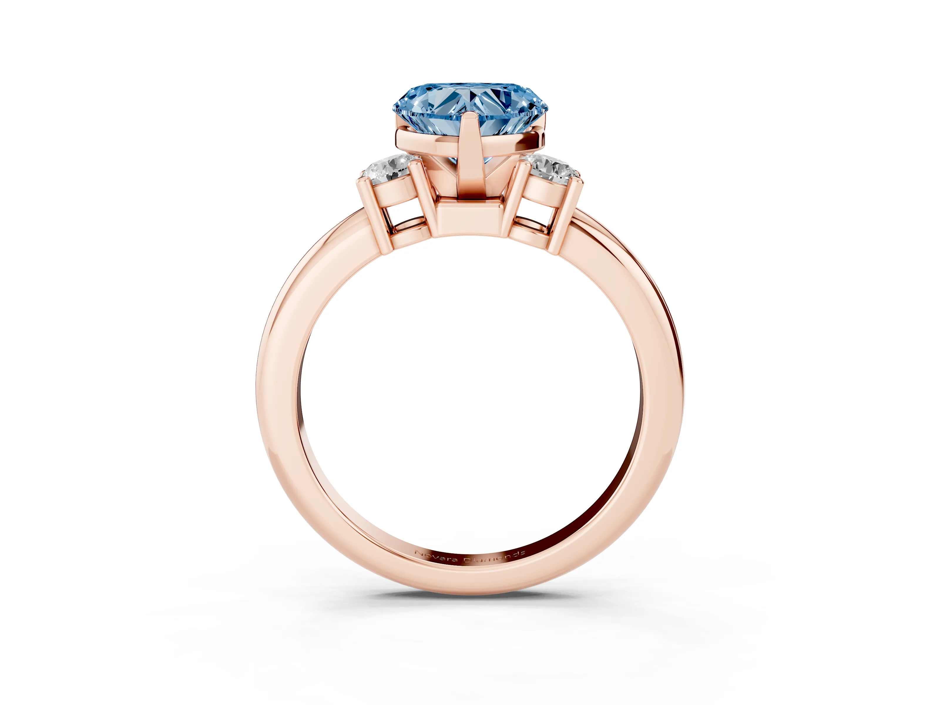 Fancy Blue Three-Stone Heart Cut Diamond Ring Set in Rose gold with Prong Setting and Plain Band