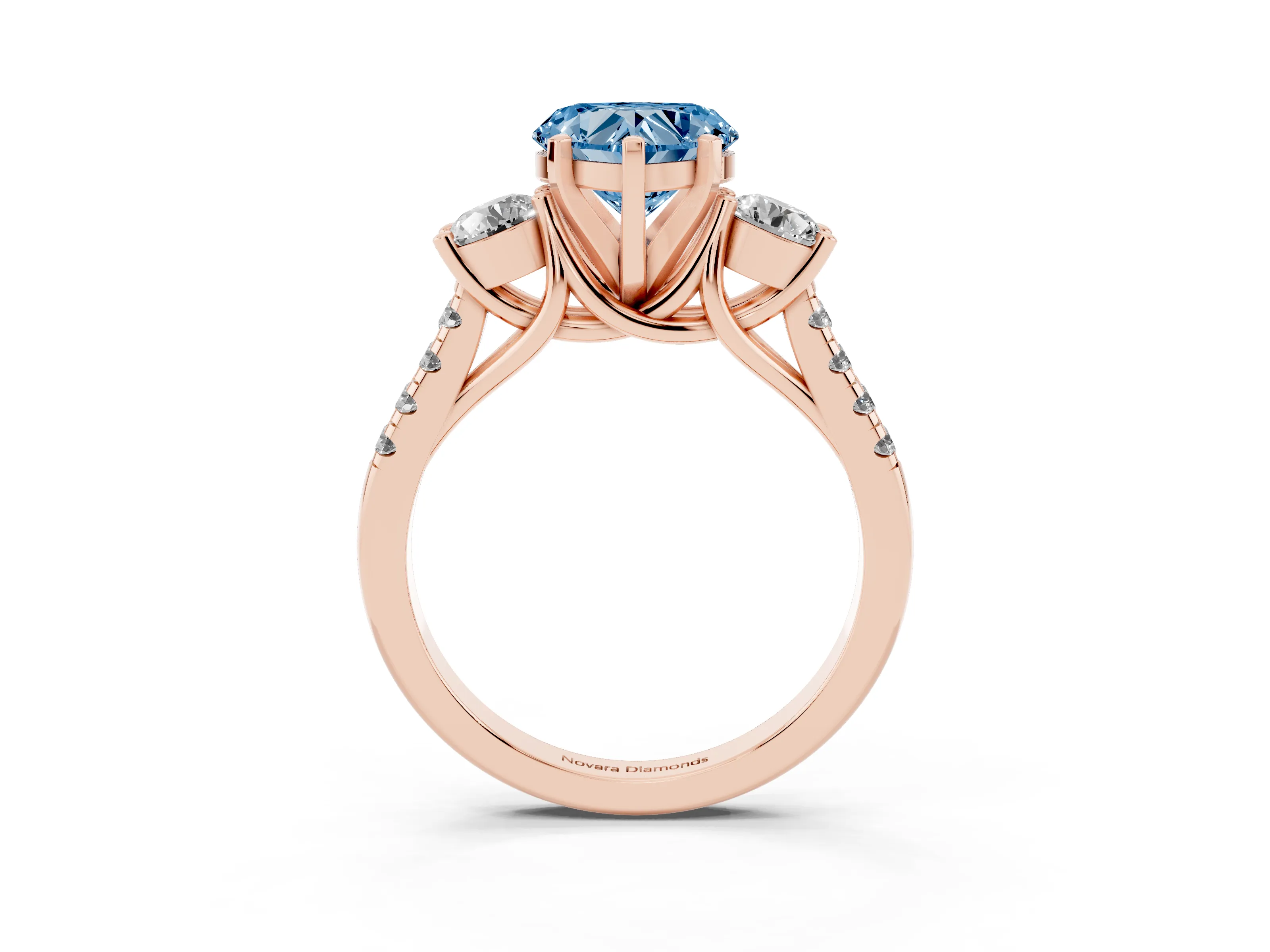 Fancy Blue Three-Stone Heart Cut Diamond Pavé Band Ring Set in Rose gold with Prong-Set Trio