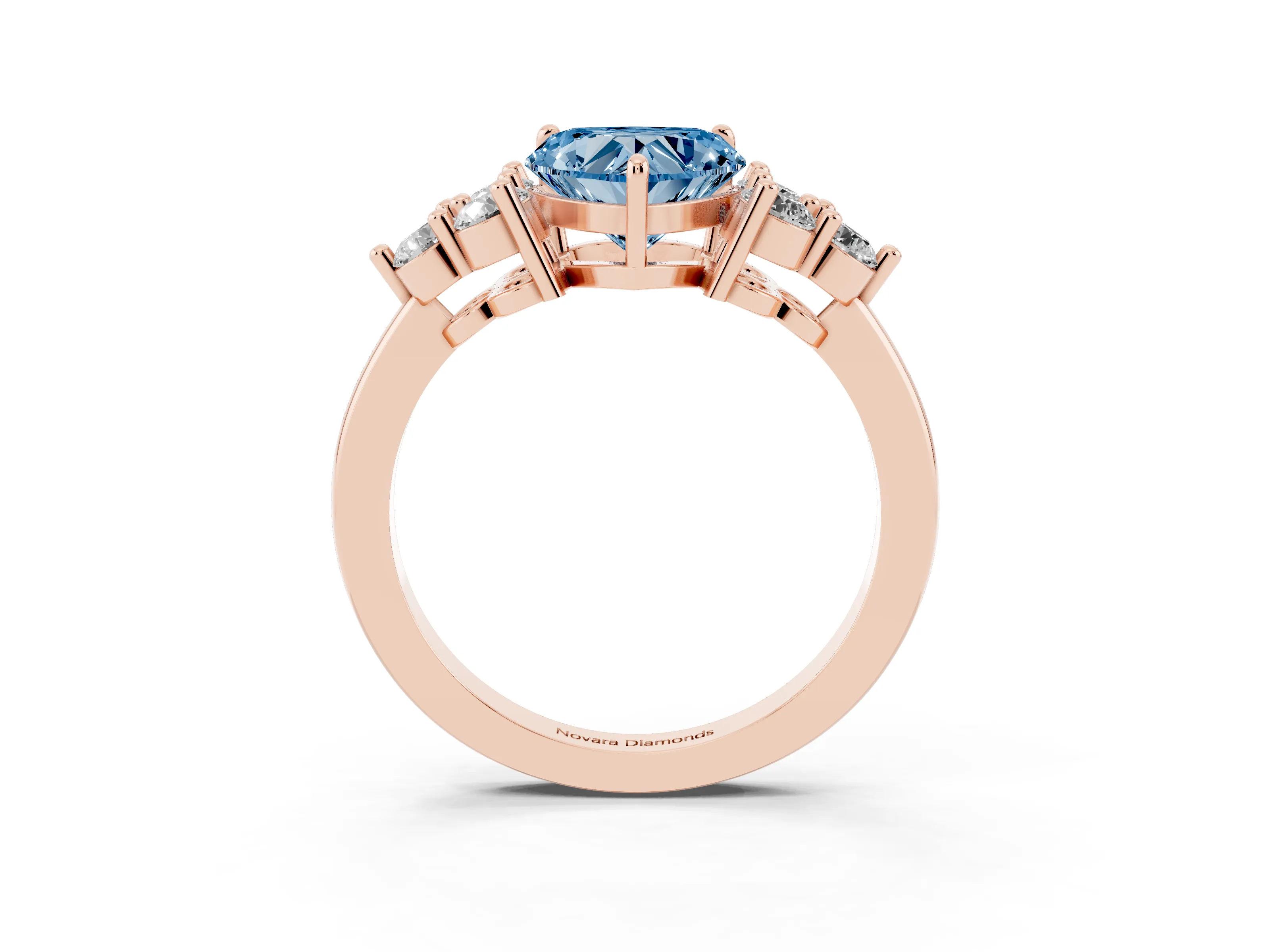 Fancy Blue Heart Cut Diamond Solitaire Ring Set in Rose gold with Cluster Accents on Each Side