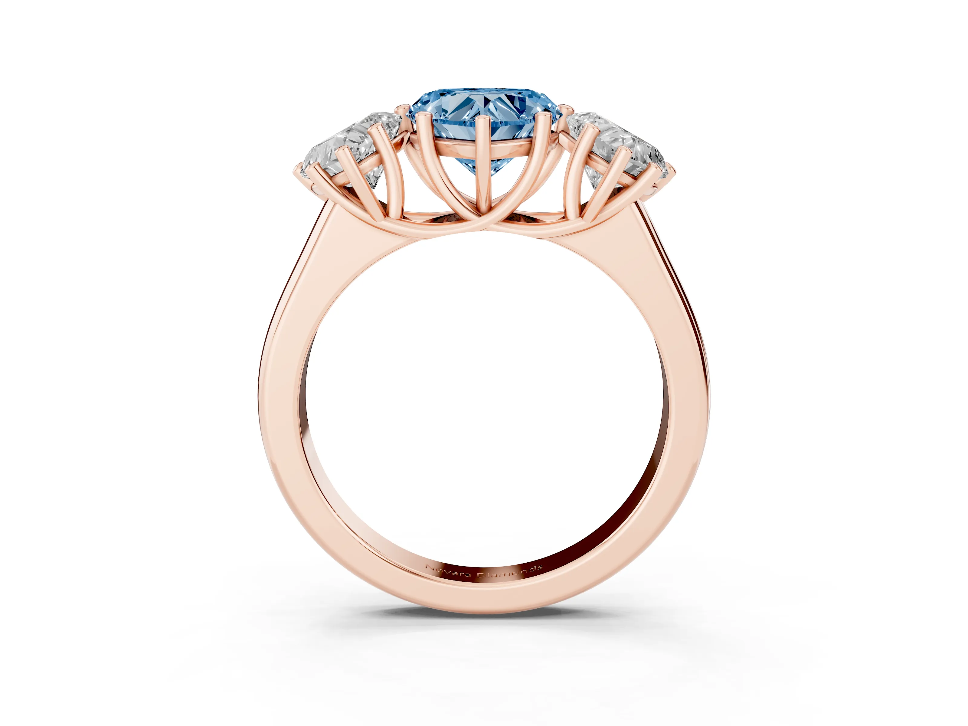 Fancy Blue Heart Cut Diamond Three-Stone Ring Set in Rose gold with Plain Polished Band