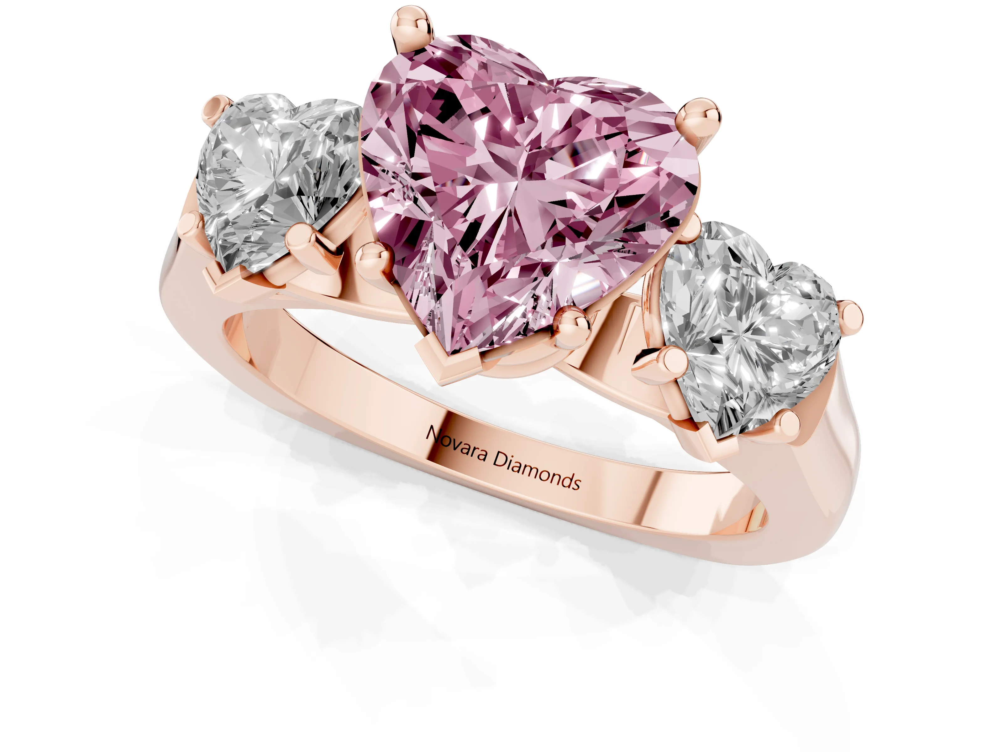 Fancy Pink Heart Cut Diamond Three-Stone Trellis Ring Set in Rose gold with Comfort Fit Band