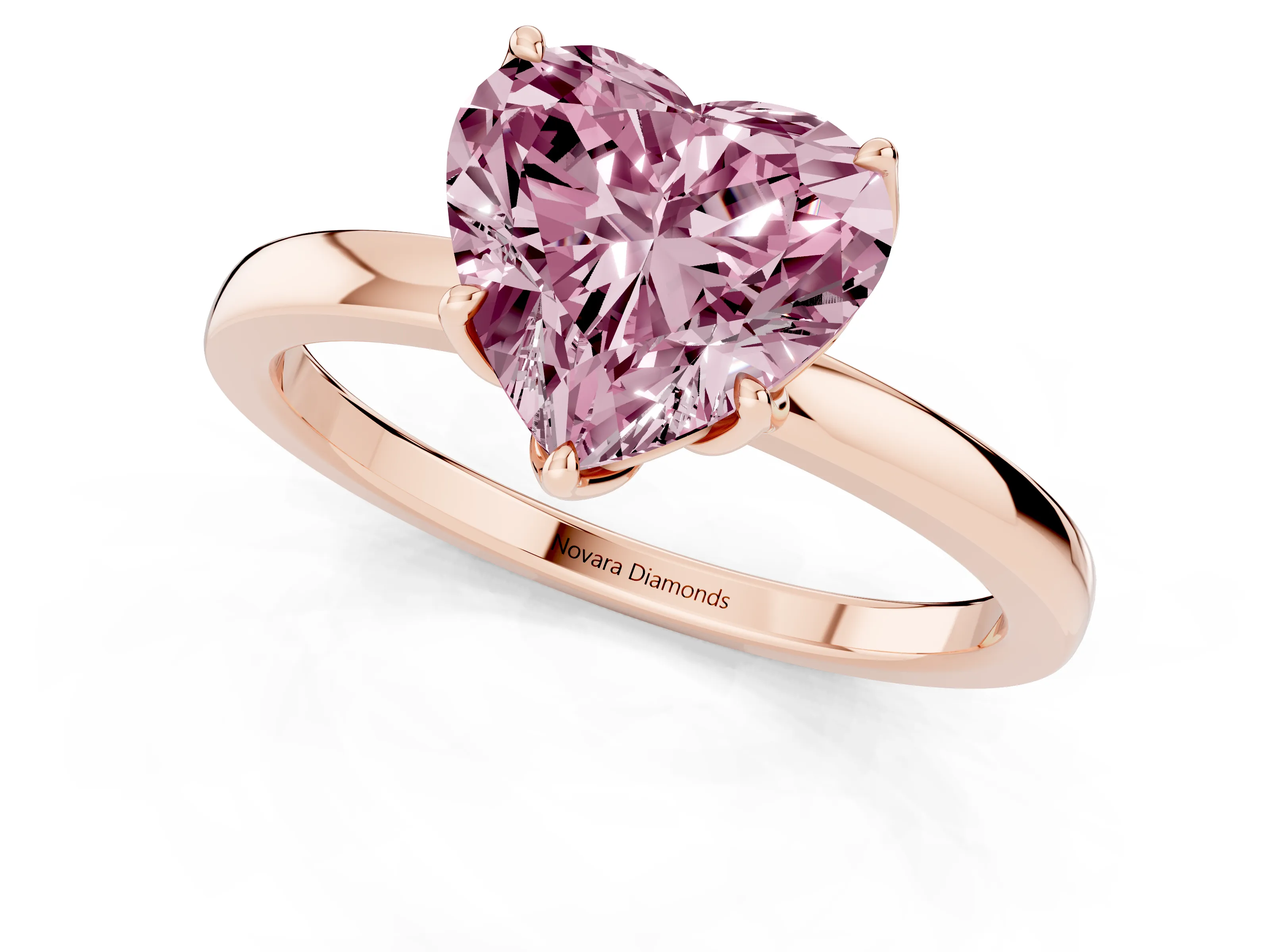 Fancy Pink Heart Cut Diamond Solitaire Ring Set in Rose gold with Prong Setting and Thin Polished Band
