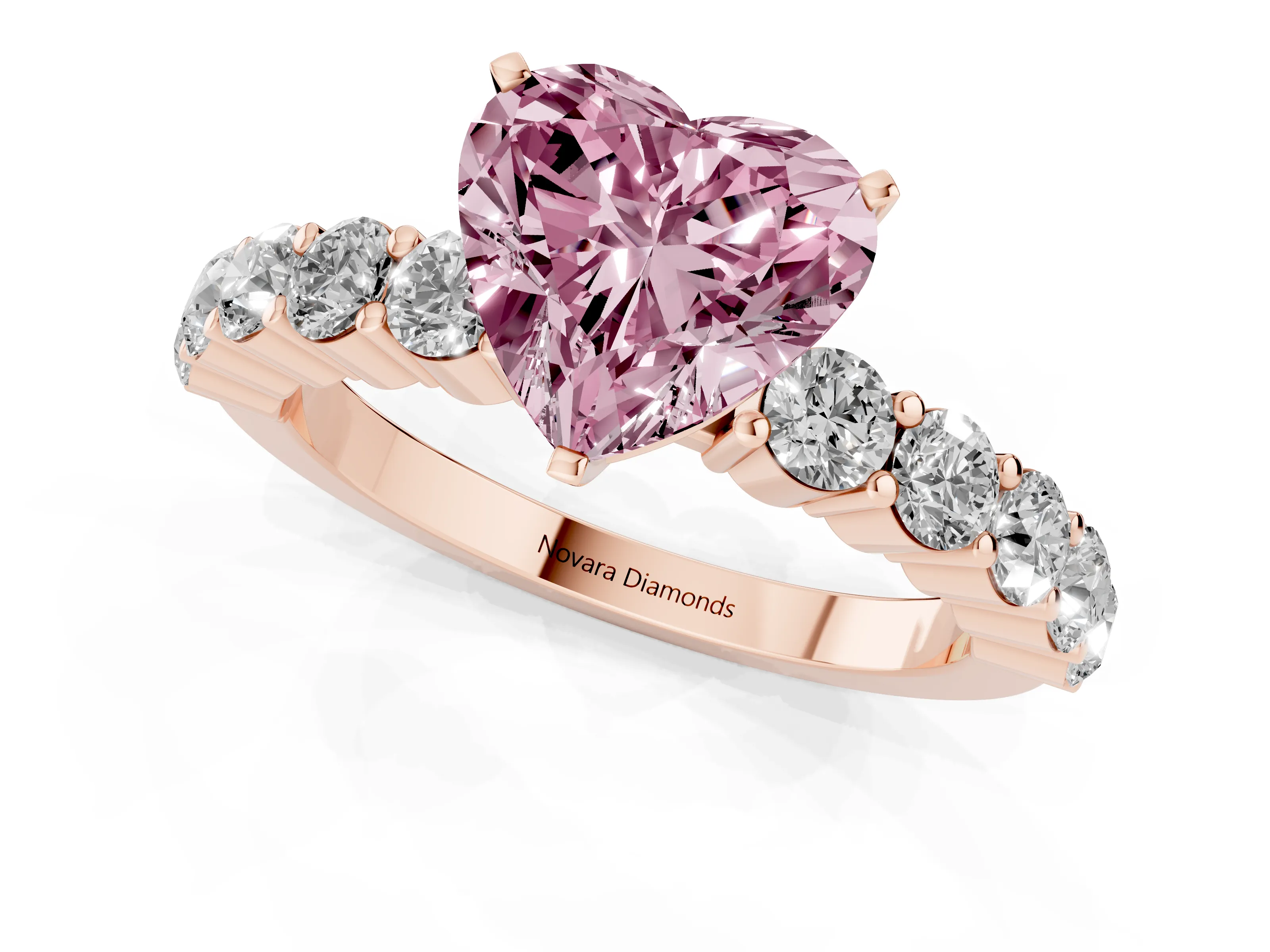 Fancy Pink Heart Cut Diamond Solitaire Ring Set in Rose gold with Shared Prong Round Side Stones